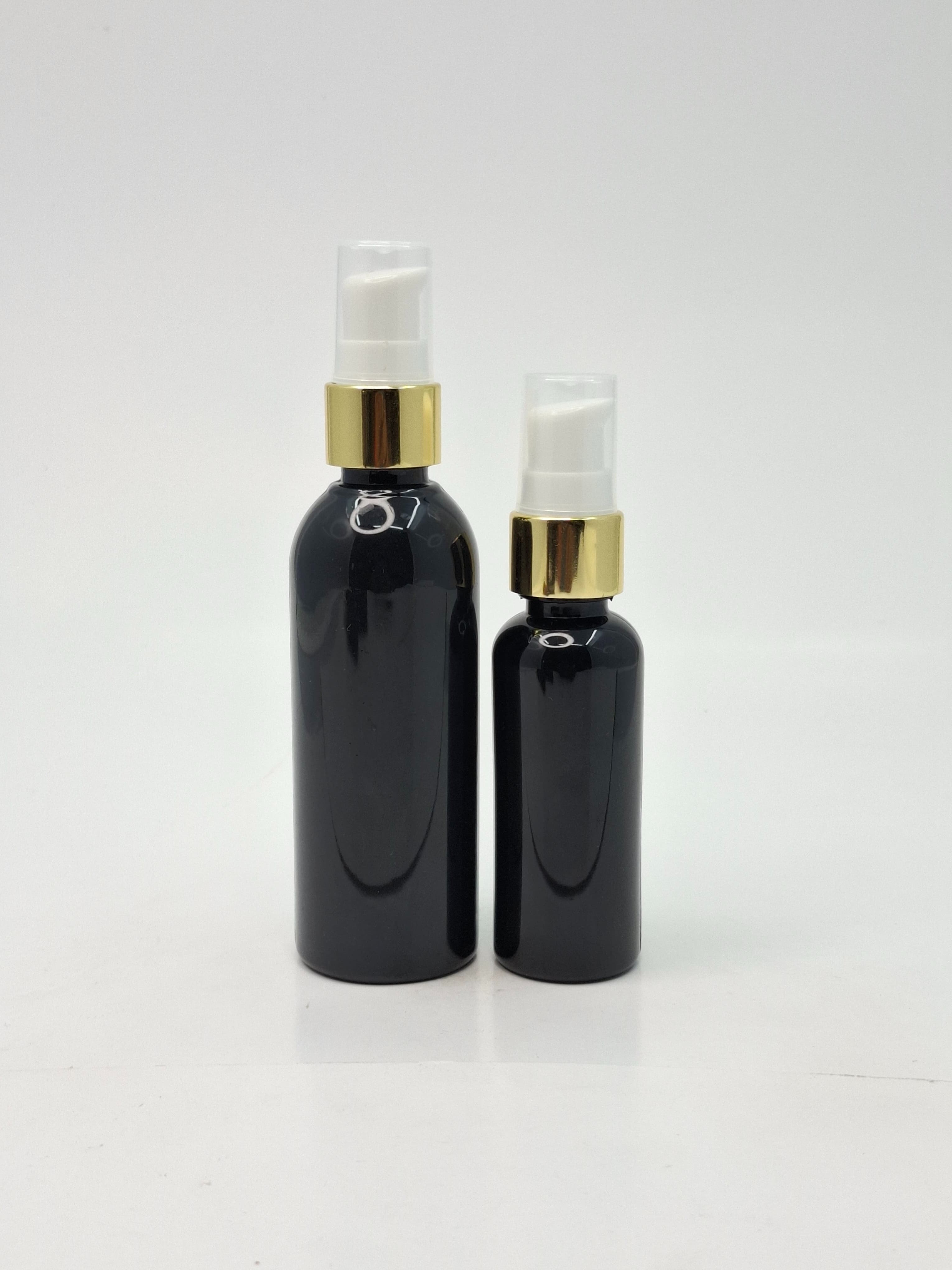 Main image of 50ml-100ml Round Bottle Black - Cream Pump Gold