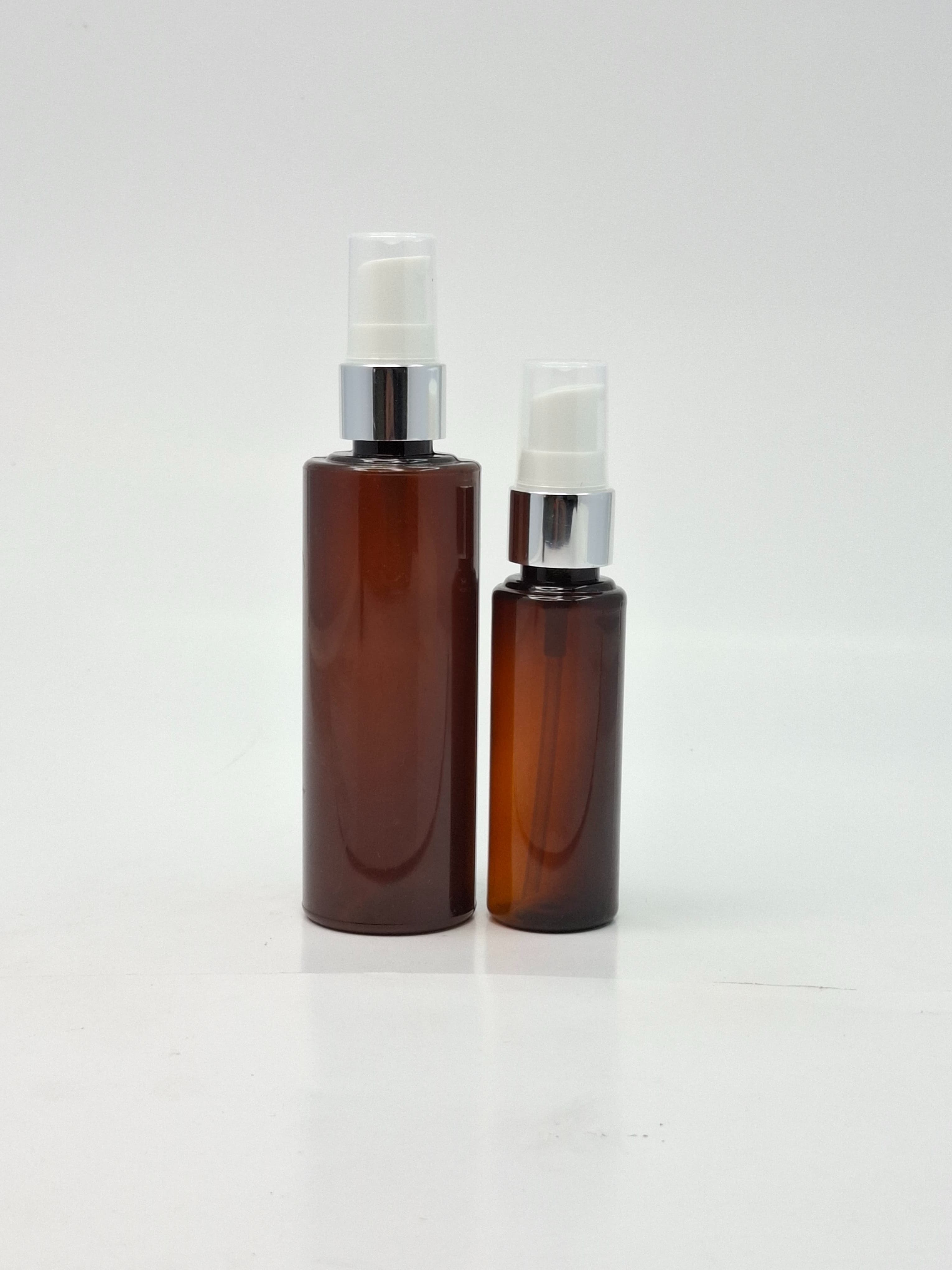 Main image of 50ml-100ml Round Bottle Amber - Cream Pump Silver
