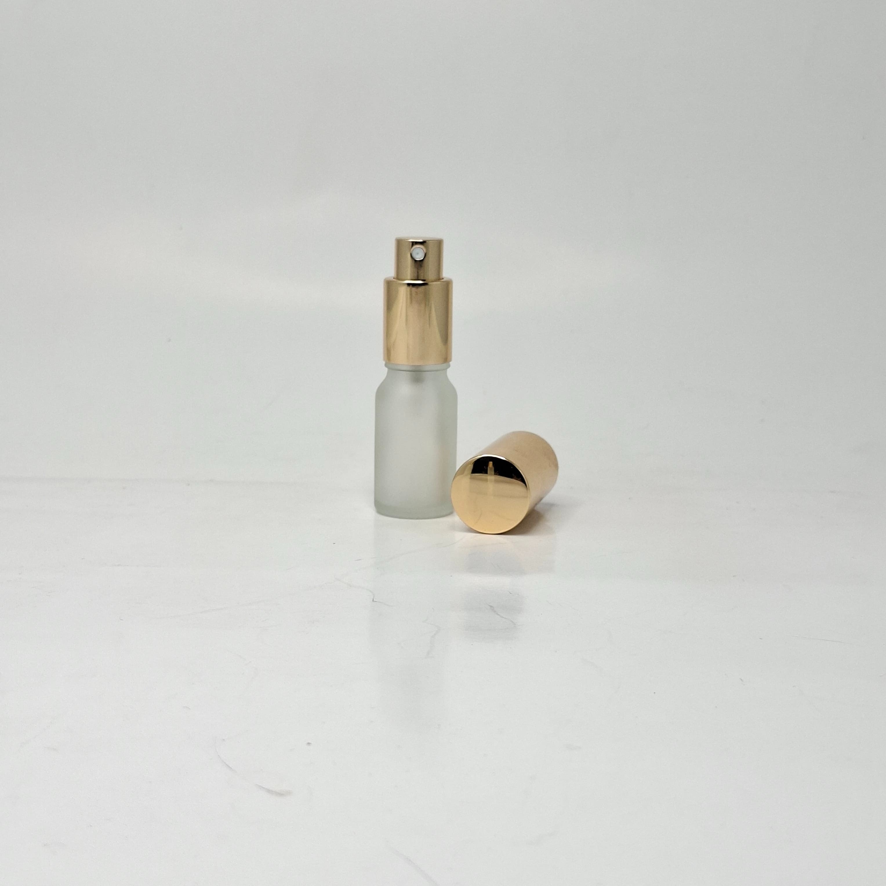 Main image of 10 ml Frosted Glass Bottle - Full Cover Gold Spray