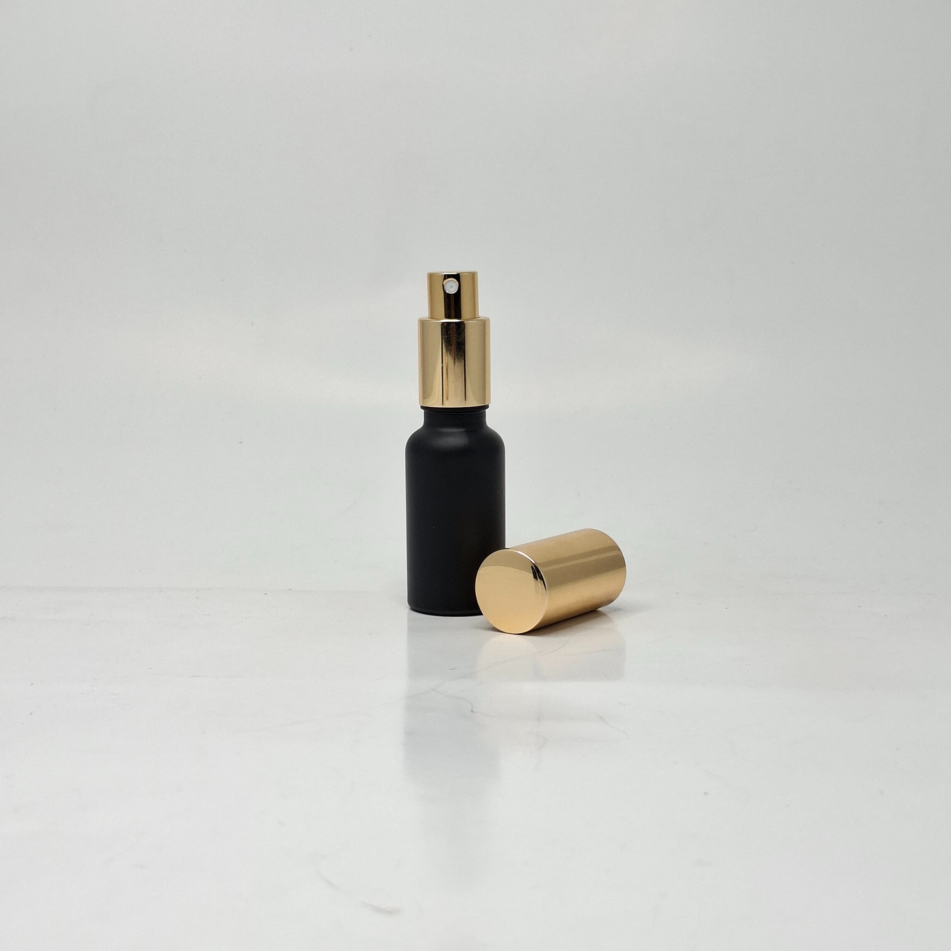 Main image of 20ml Black Glass Bottle - Full Cover Gold Spray