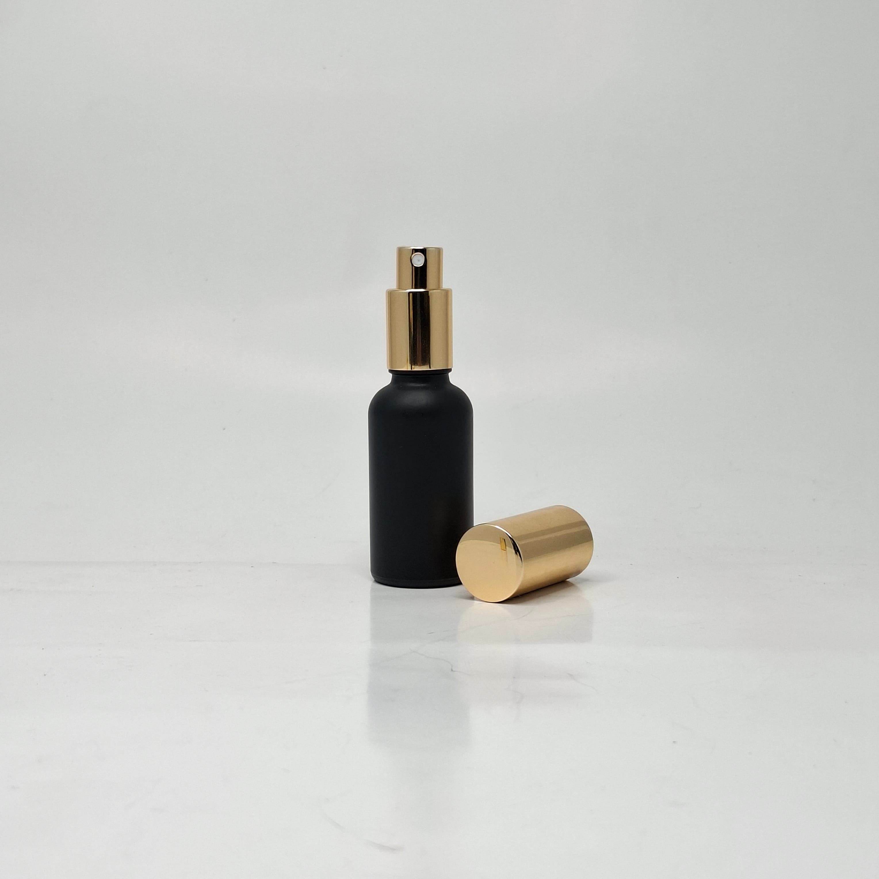 Main image of 30ml Black Glass Bottle - Full Cover Gold Spray