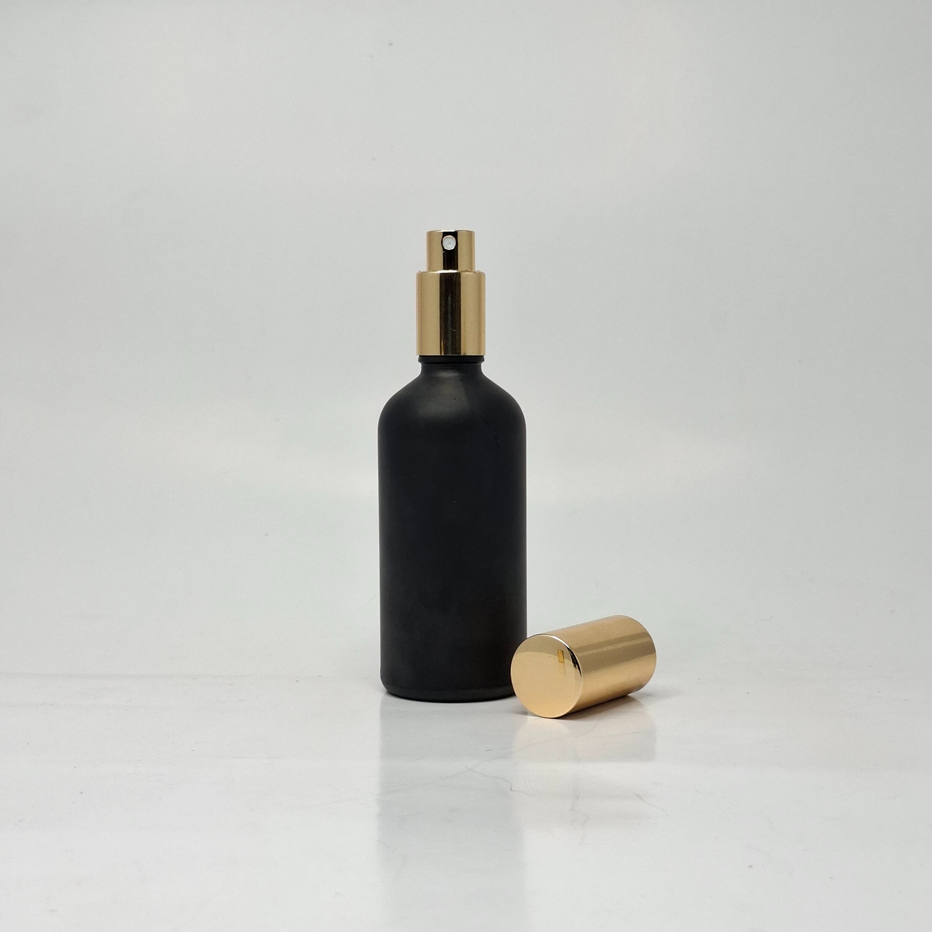 Main image of 100ml Black Glass Bottle - Full Cover Gold Spray
