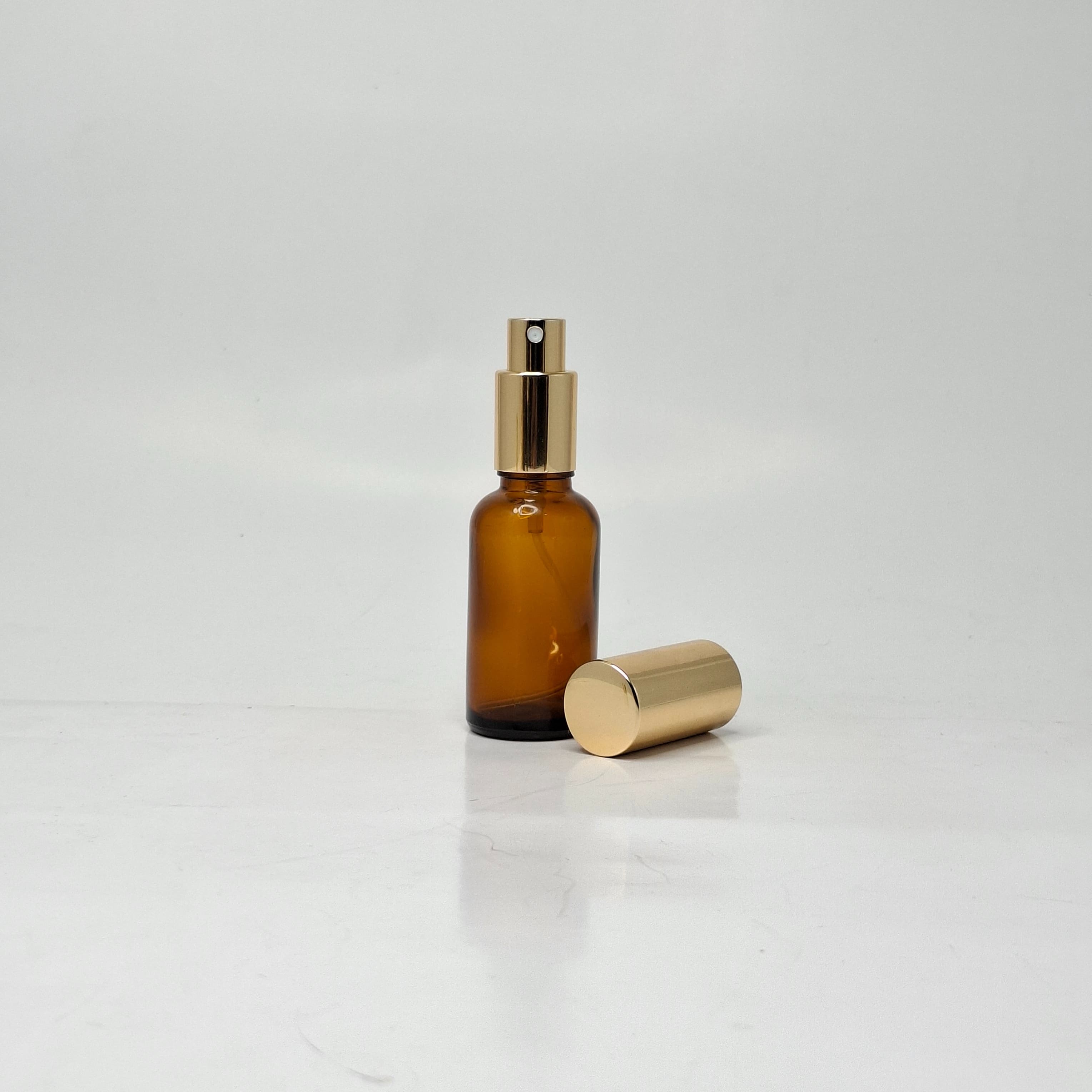 Main image of 30ml  Amber Glass Bottle - Full Cover Gold Spray