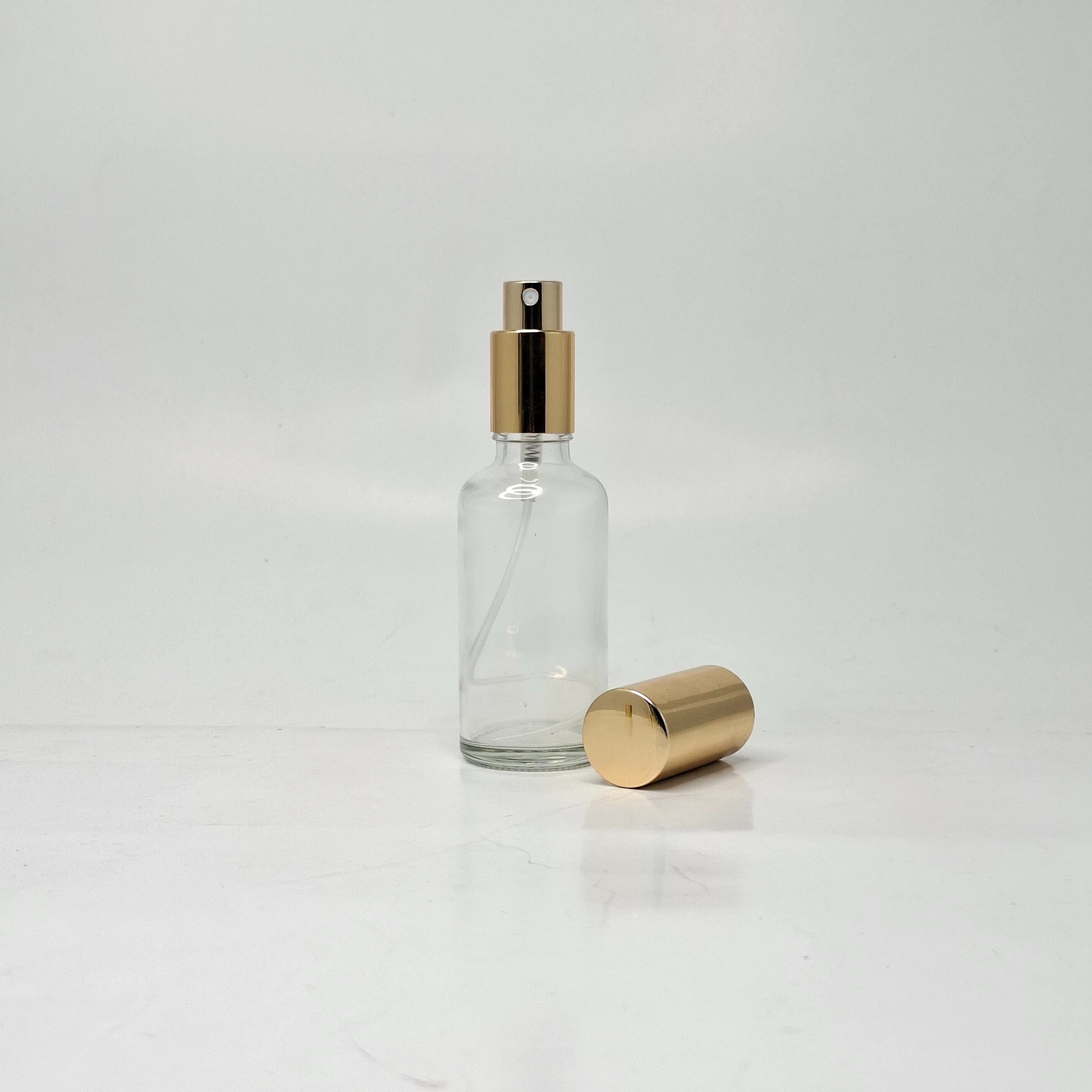 Main image of 50ml Clear Glass Bottle - Full Cover Gold Spray 