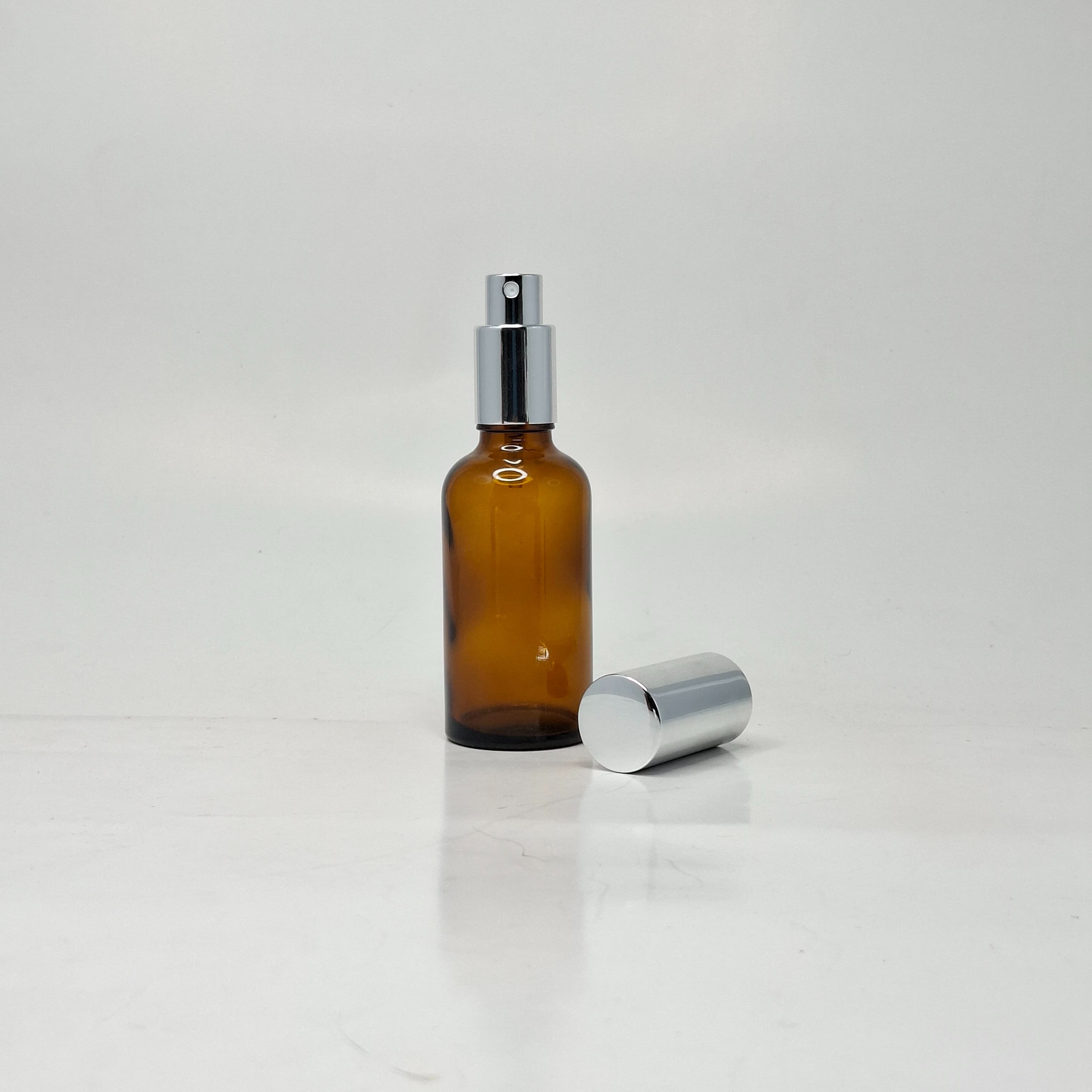 Main image of 50ml Amber Glass Bottle - Full Cover Silver Spray 