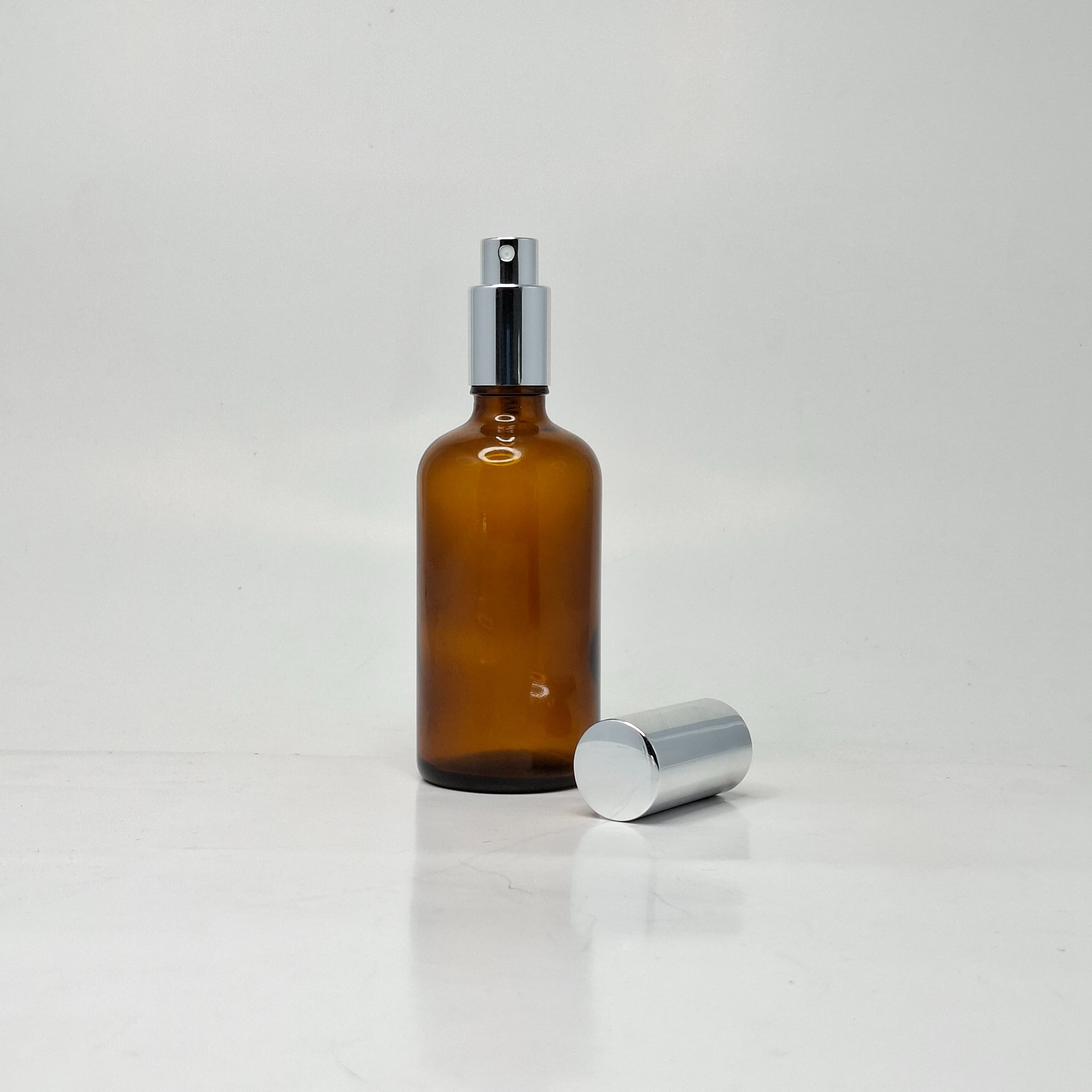 Main image of 100ml Amber Glass Bottle - Full Cover Silver Spray 