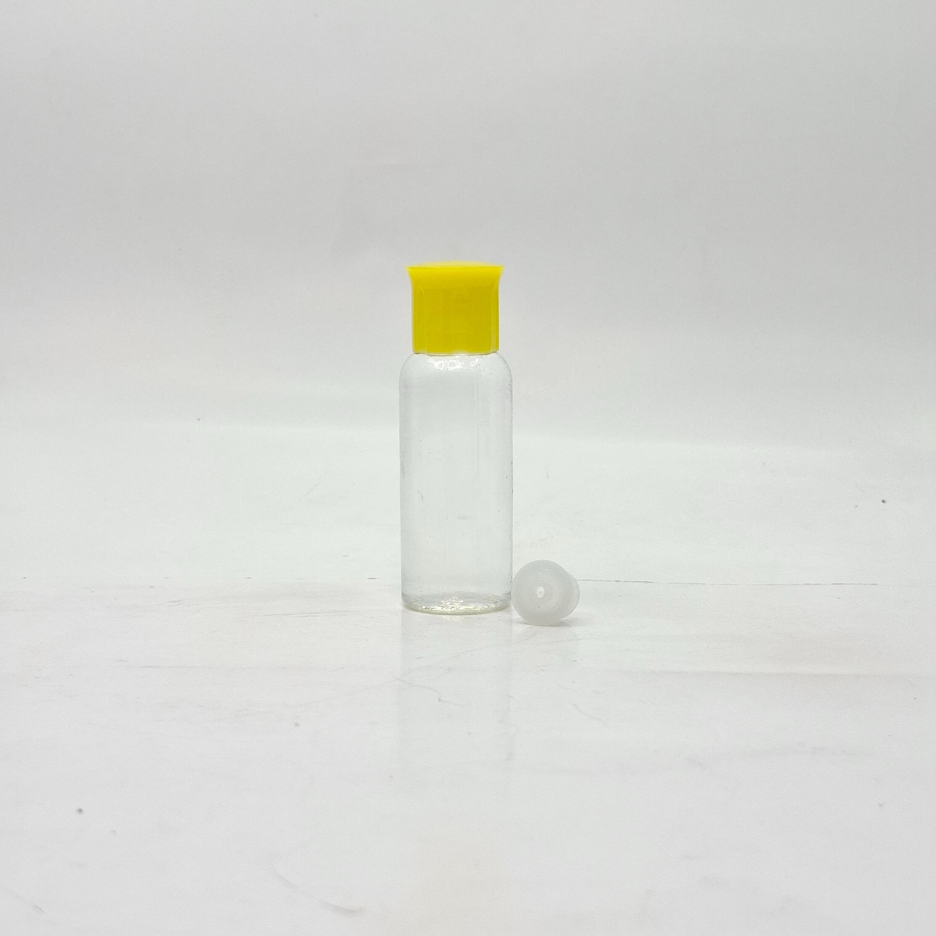 Main image of 40ml Round Bottle Clear - Oil Lid Yellow