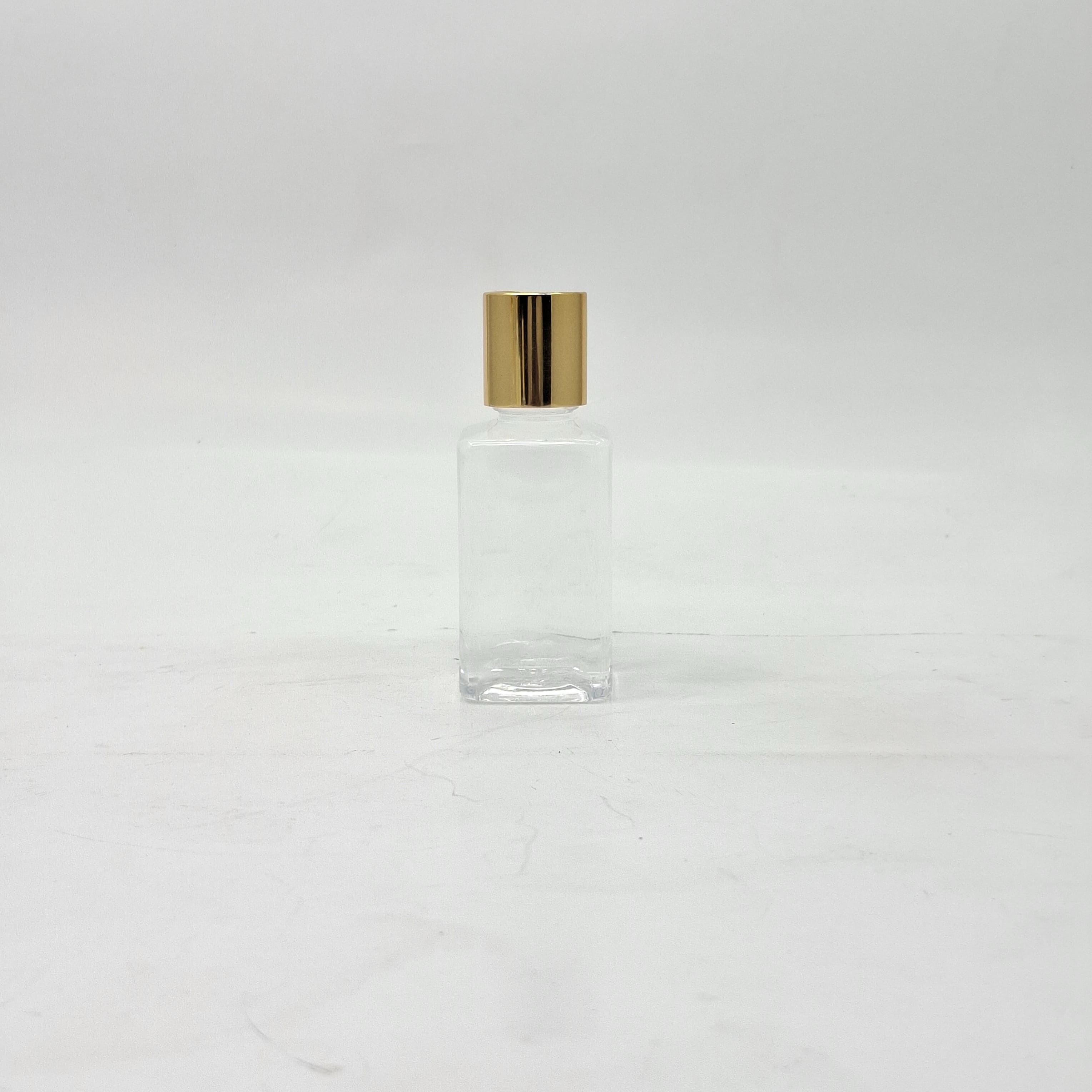 Main image of 50ml Squar Pet Clear Bottle  -  Press Lid Gold