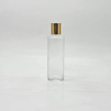 100ml Round Flat Nack Bottle Clear - press Lid Gold