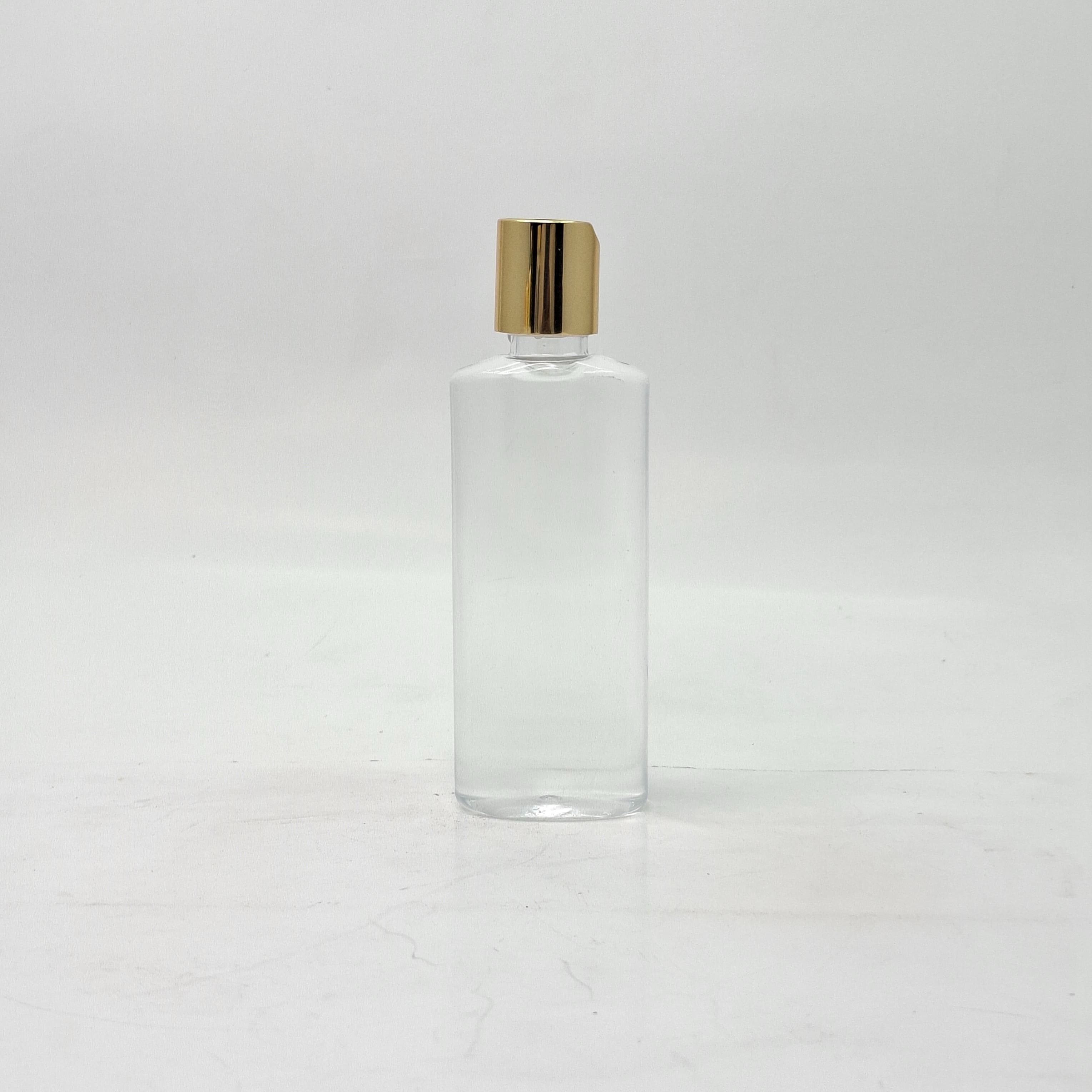 Main image of 100ml Ovel Bottle Clear - Press Lid Gold 