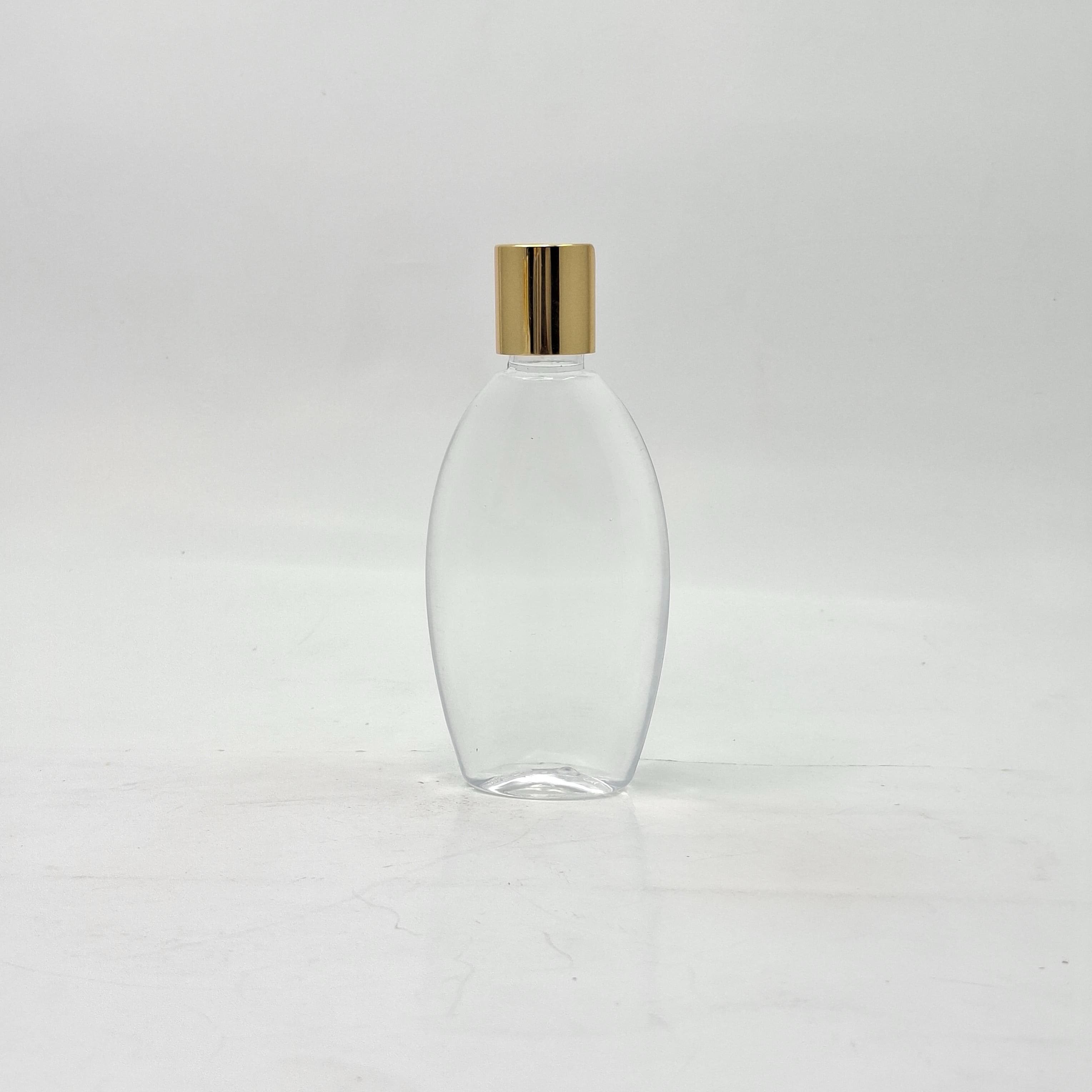 Main image of 100ml Body Lotion Bottle Clear - Press Lid Gold