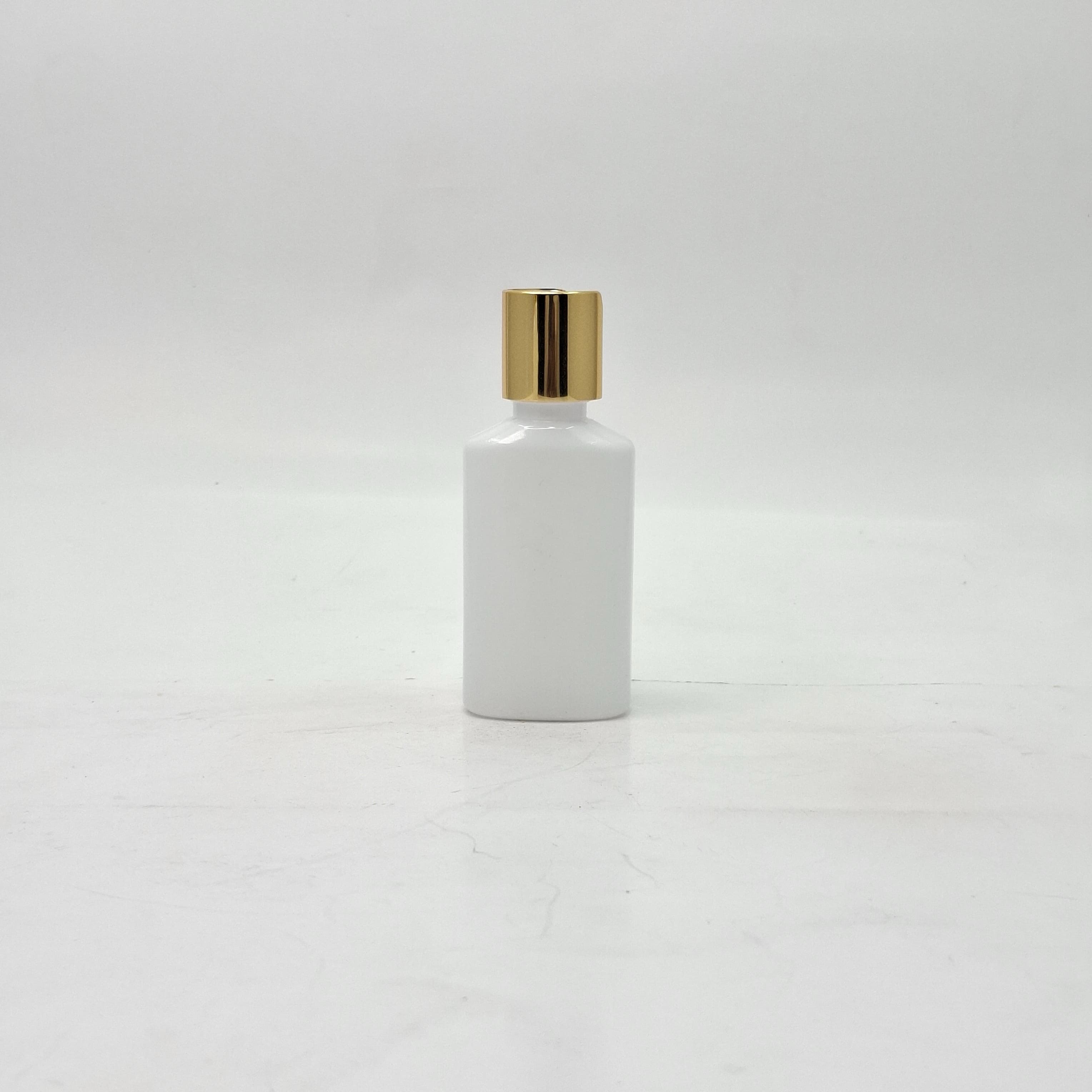 Main image of 50ml Oval Bottle White - Press Lid Gold