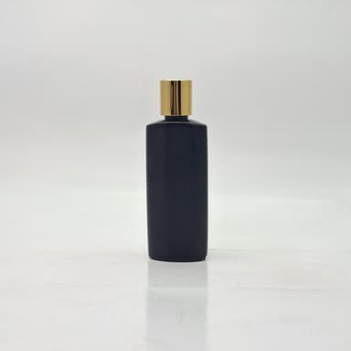 100ml Oval HDPE Black Bottle - Press Lid Gold 