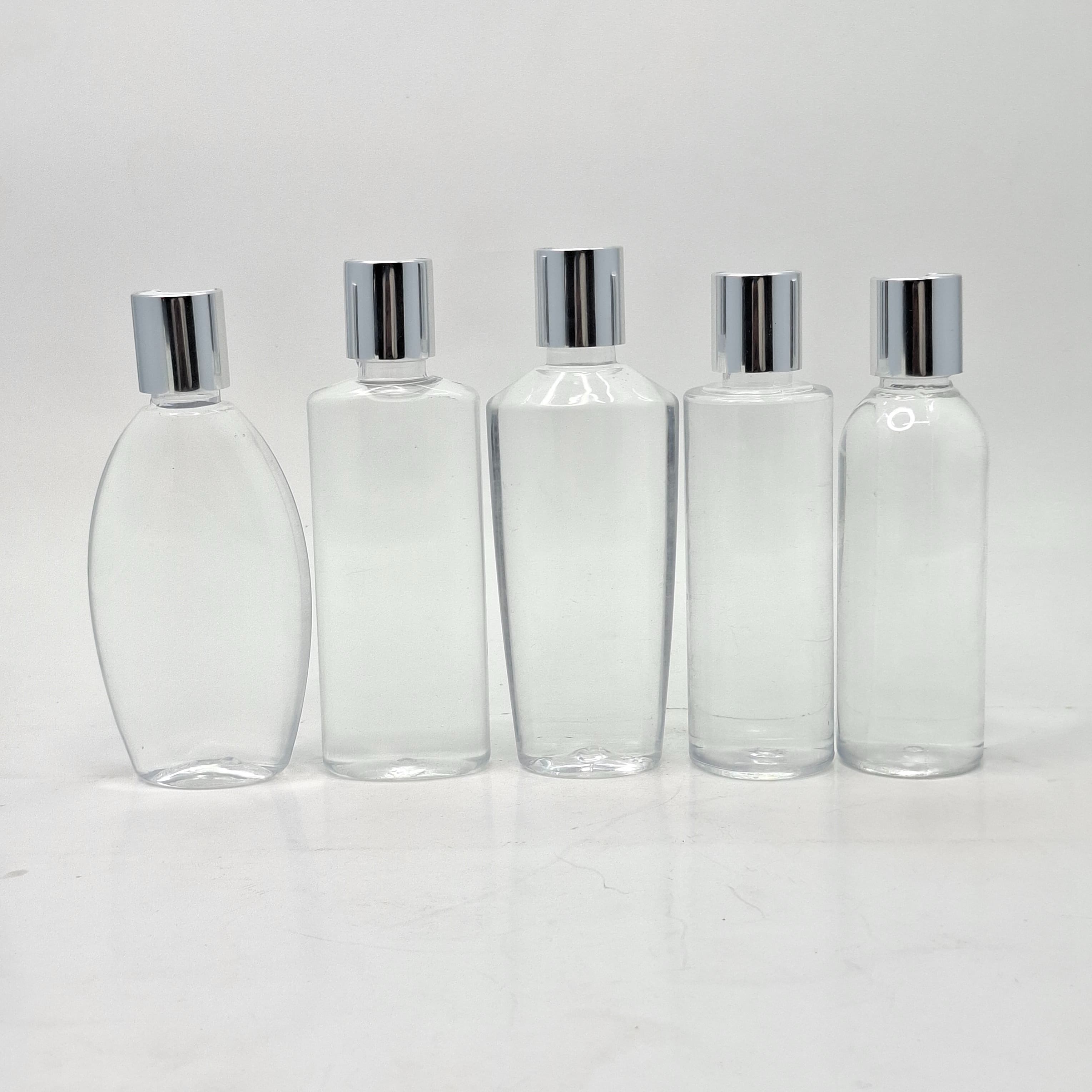 Thumbnail 2 of 100ml Round Flat Nack Bottle Clear - Press Lid Silver