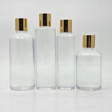 Round Clear Bottle - Press Cap Gold