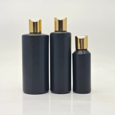 Round HDPE Black Bottle - Press Lid Gold