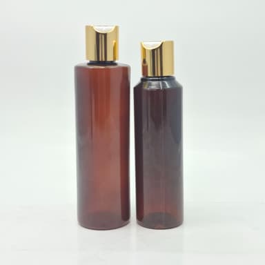 Round Amber Bottle - Press Cap Gold