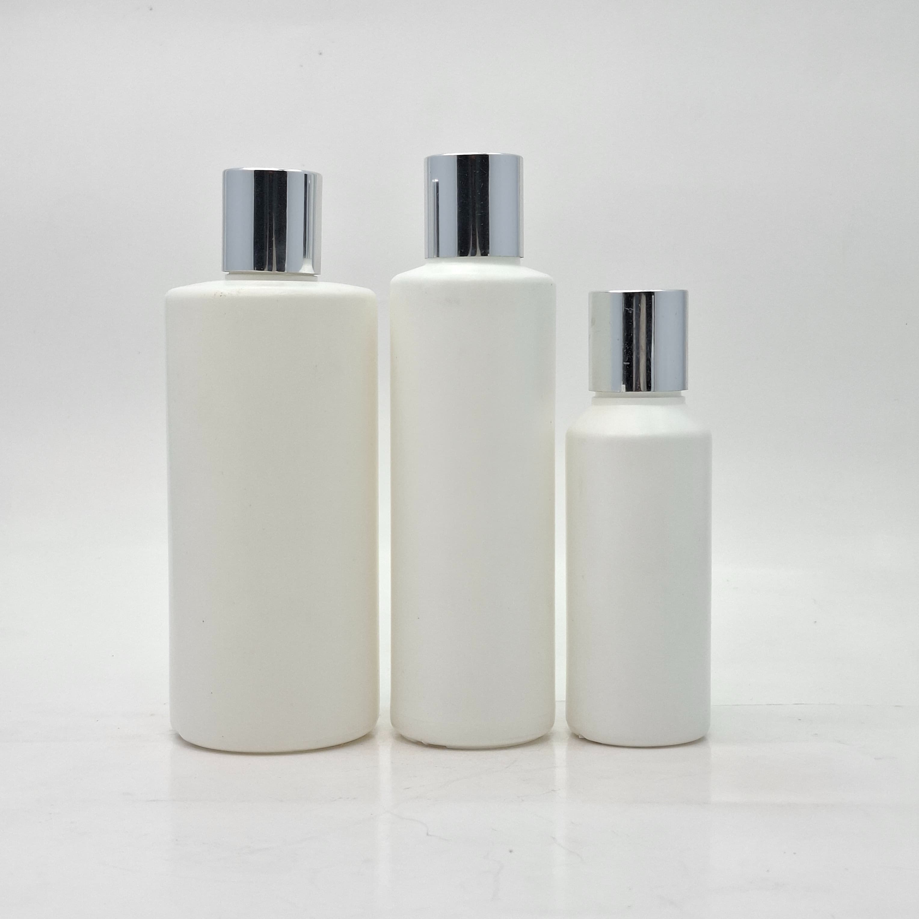 Main image of HDPE White Bottle - Press Cap Silver