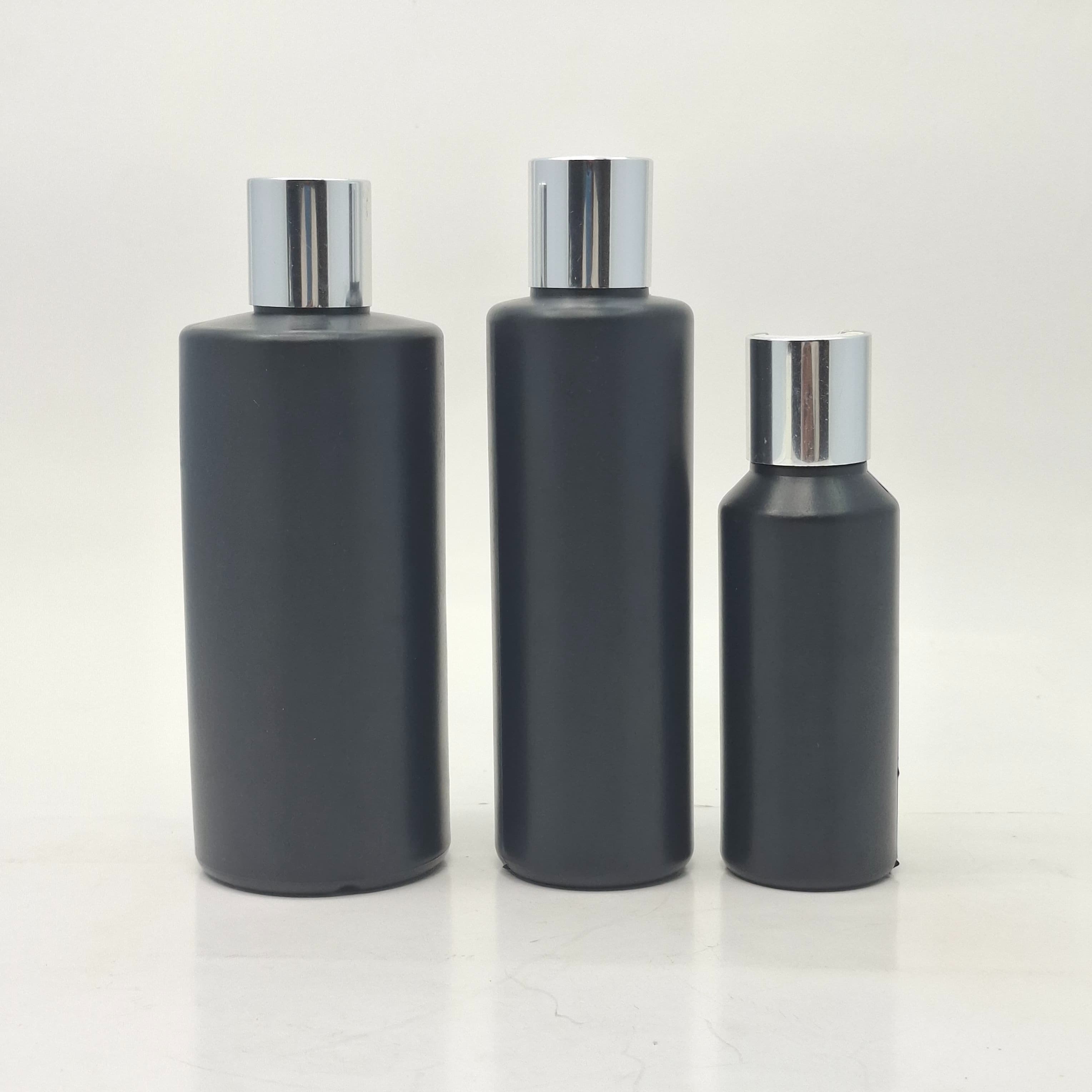Main image of HDPE Black Bottle - Press Cap Silver