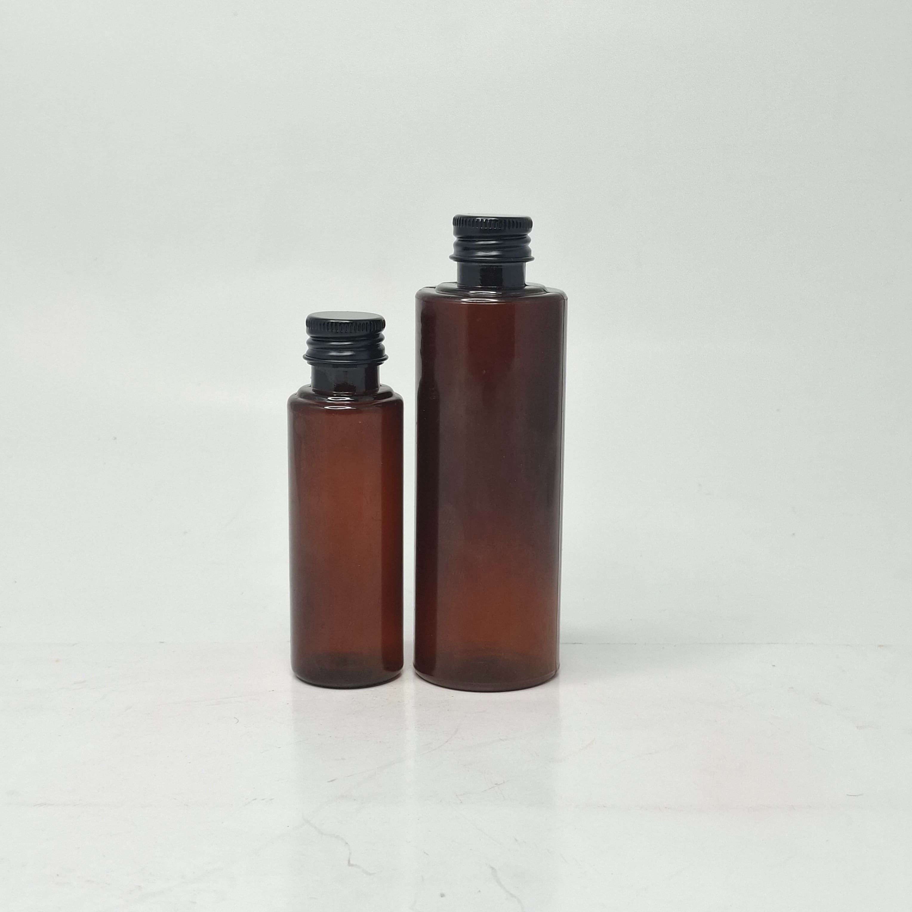 Main image of 50ml-100ml Round Bottle Amber - Alu Cap Black
