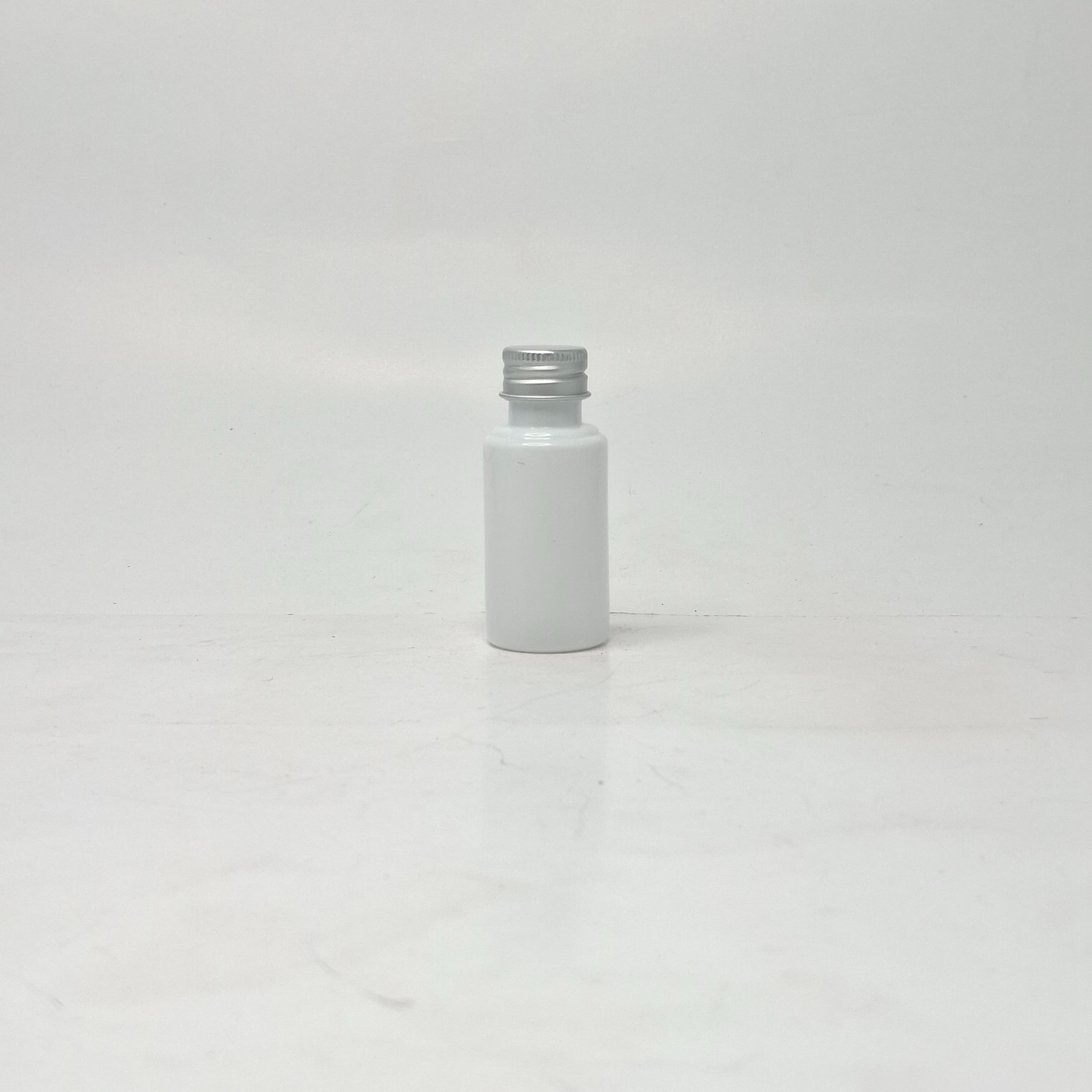 Main image of 30ml Round Bottle White - Alu Cap silver