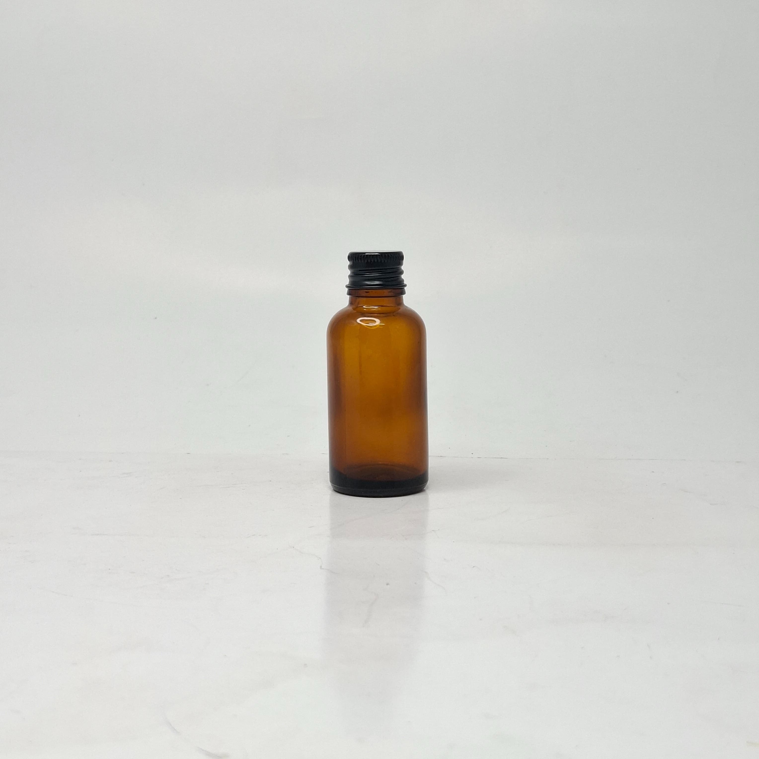 Main image of 30ml Amber Glass Bottle - Alu Cap Black