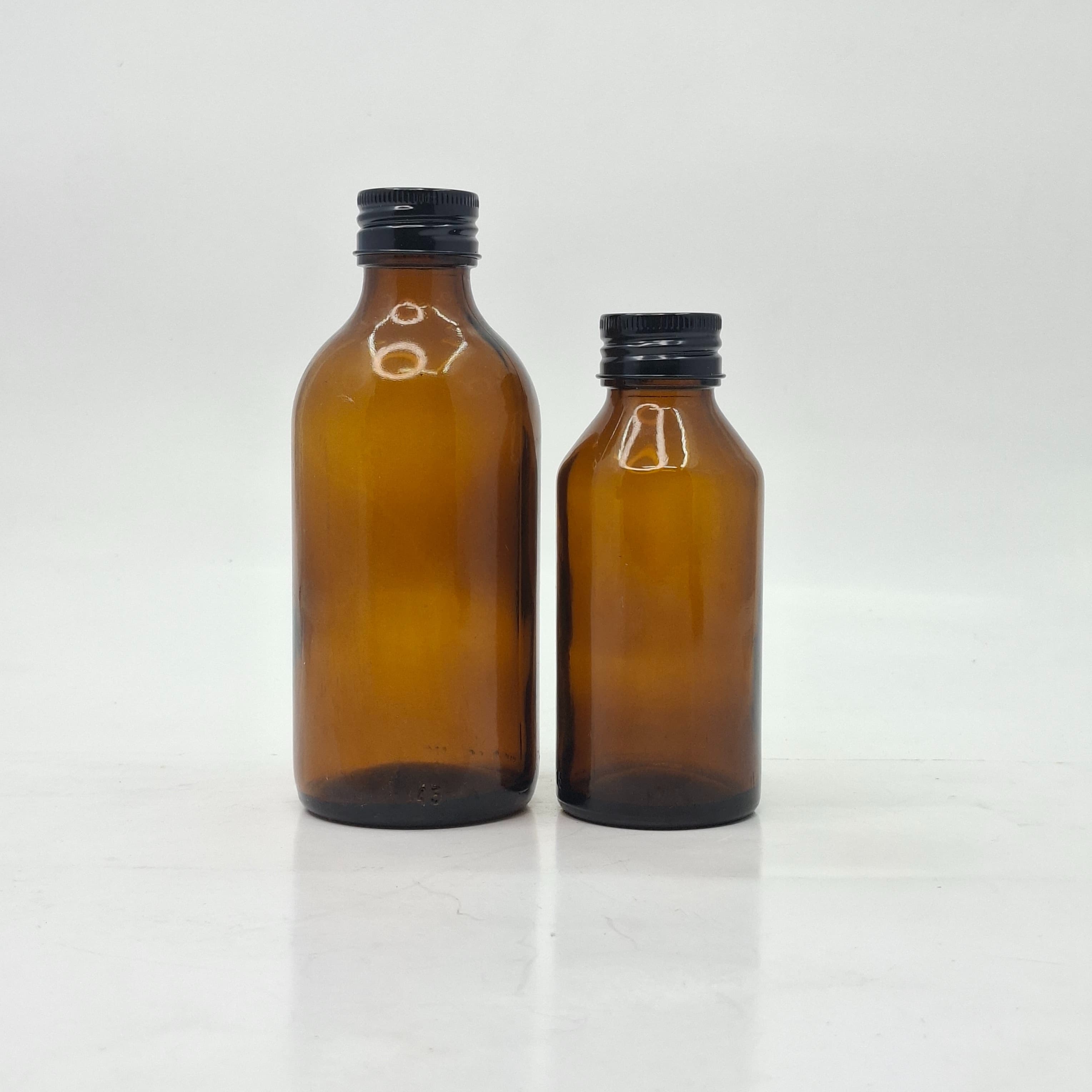 Main image of Amber Glass Bottle - Alu Cap Black
