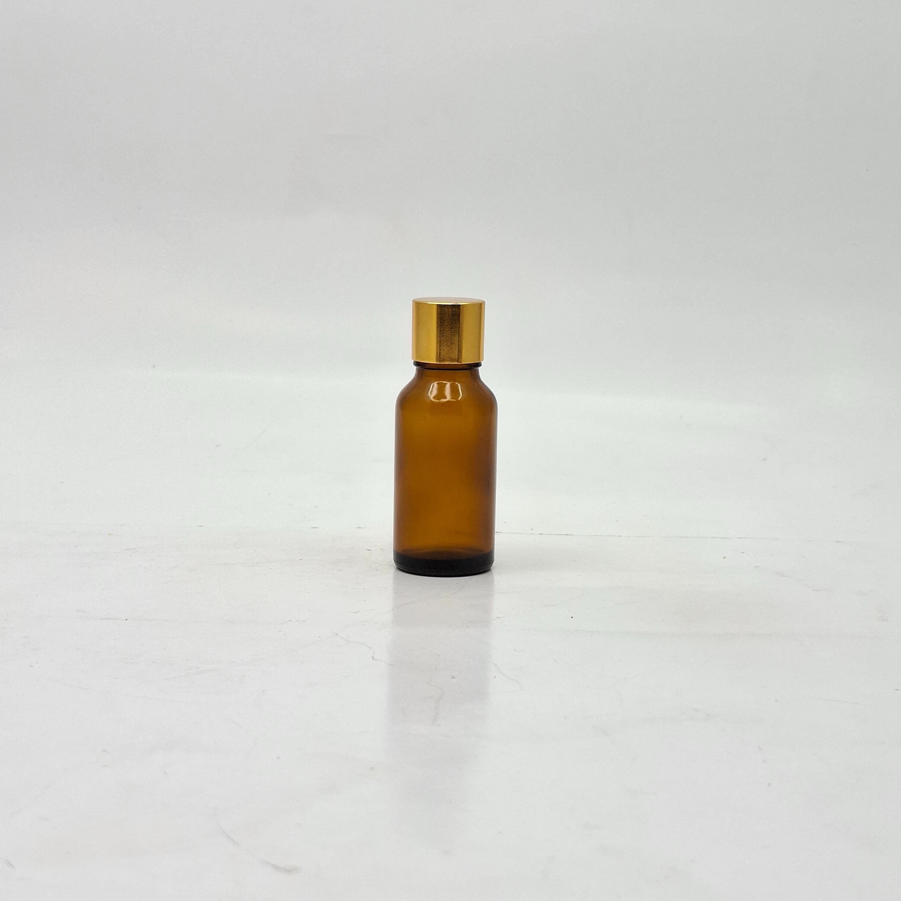 Main image of 20ml Amber Glass Bottle -18mm Shine Gold Lid with insert