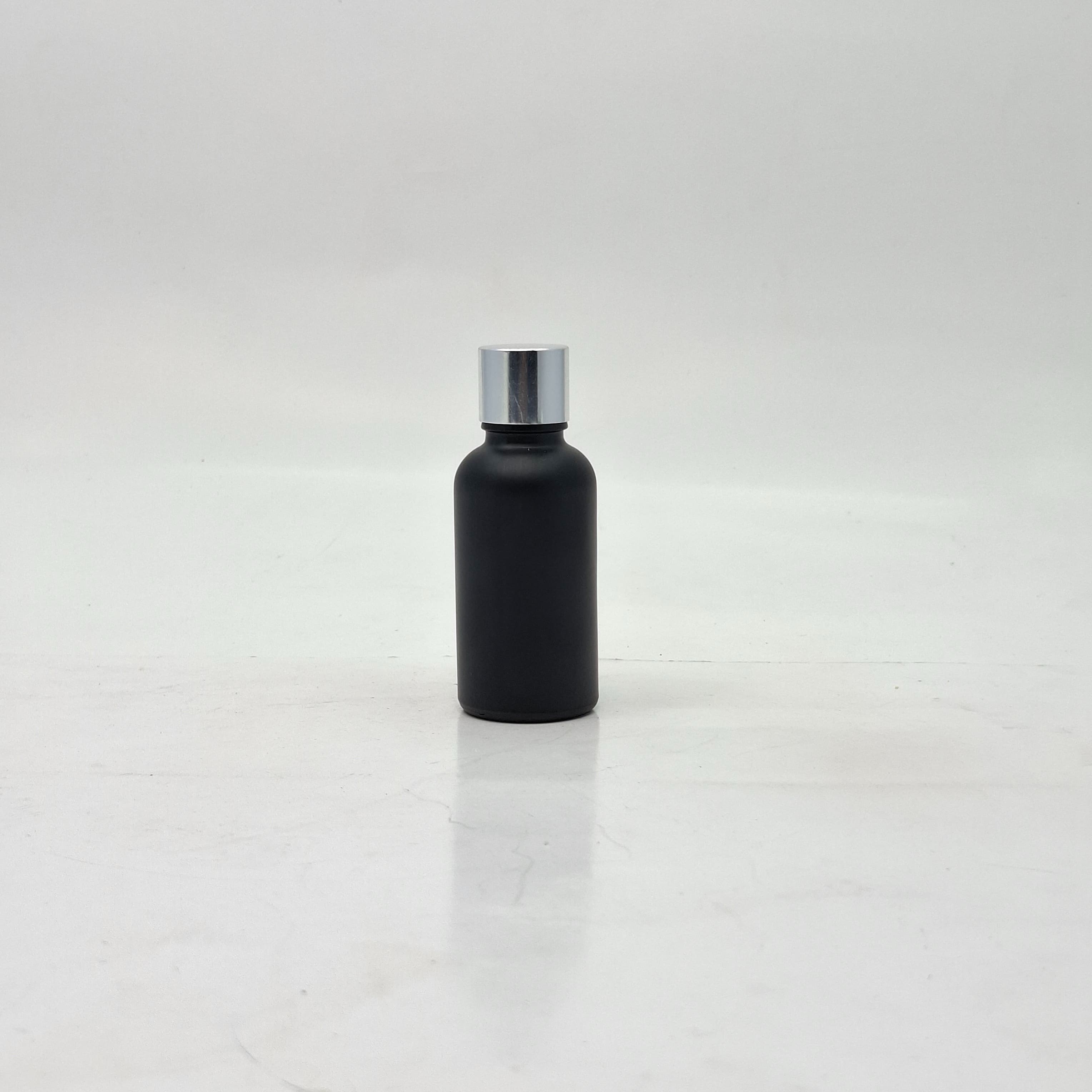 Main image of 30ml Black Glass Bottle -18mm Shine Silver Lid with insert