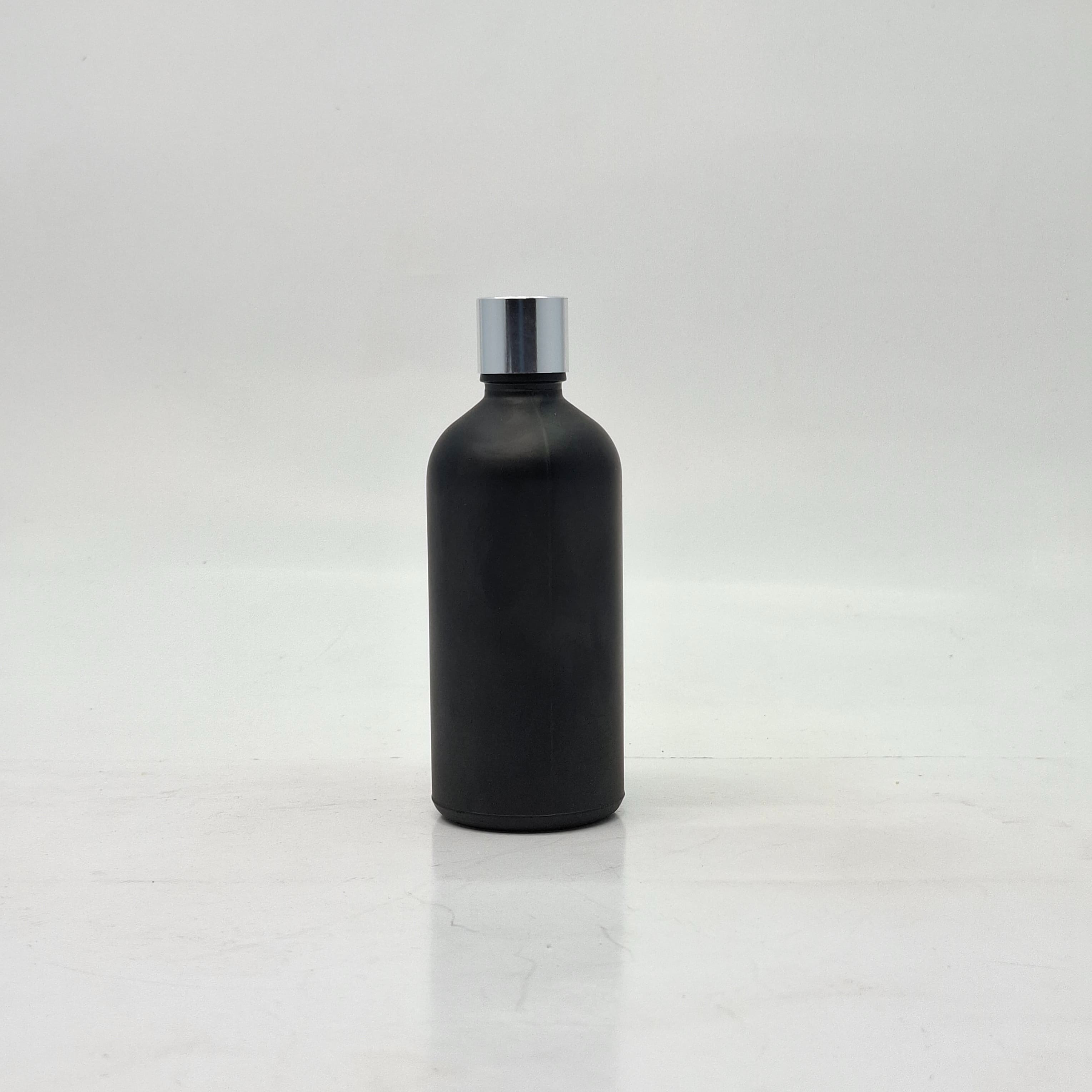 Main image of 100ml Black Glass Bottle -18mm Shine Silver Lid with insert