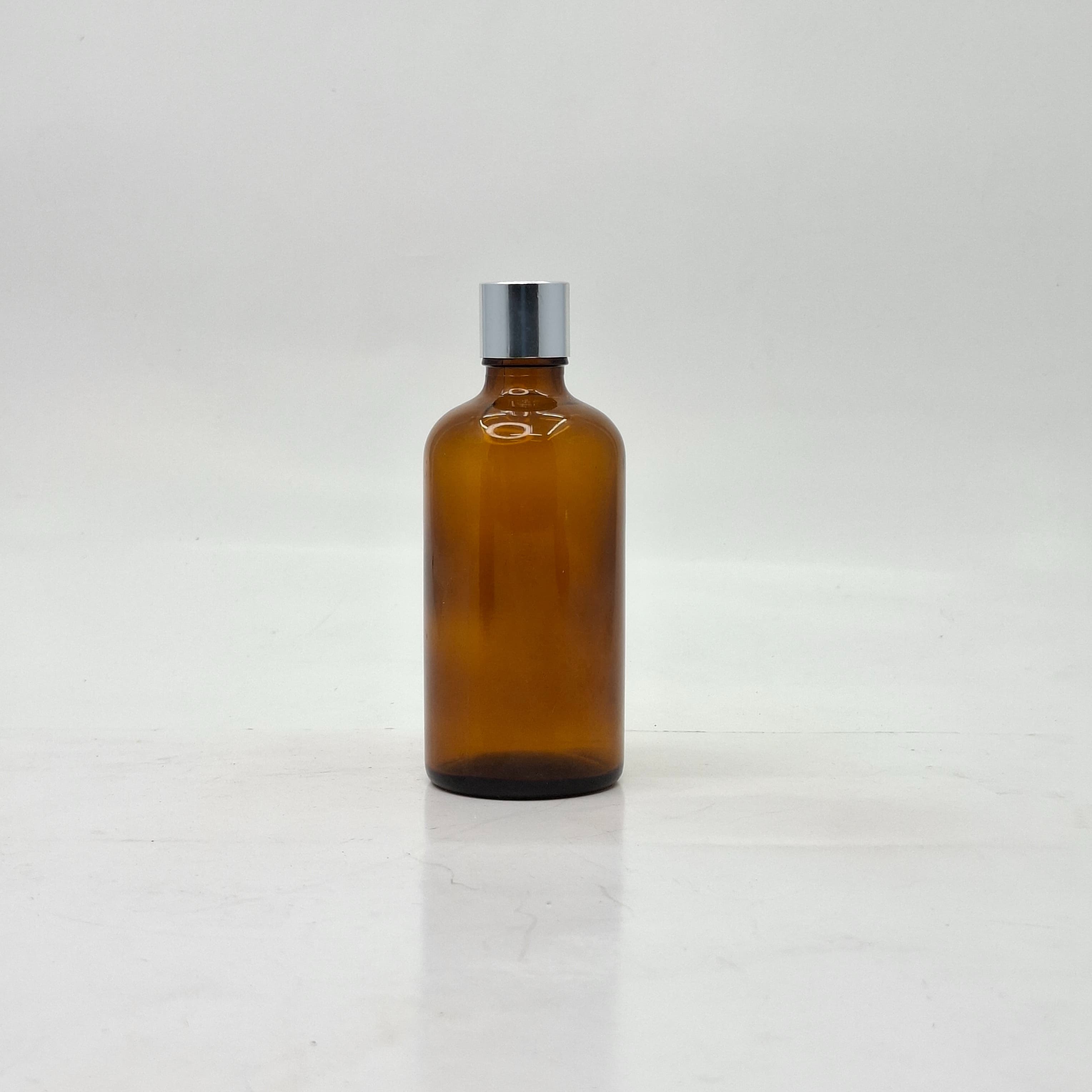 Main image of 100ml Amber Glass Bottle -18mm Shine Silver Lid with insert