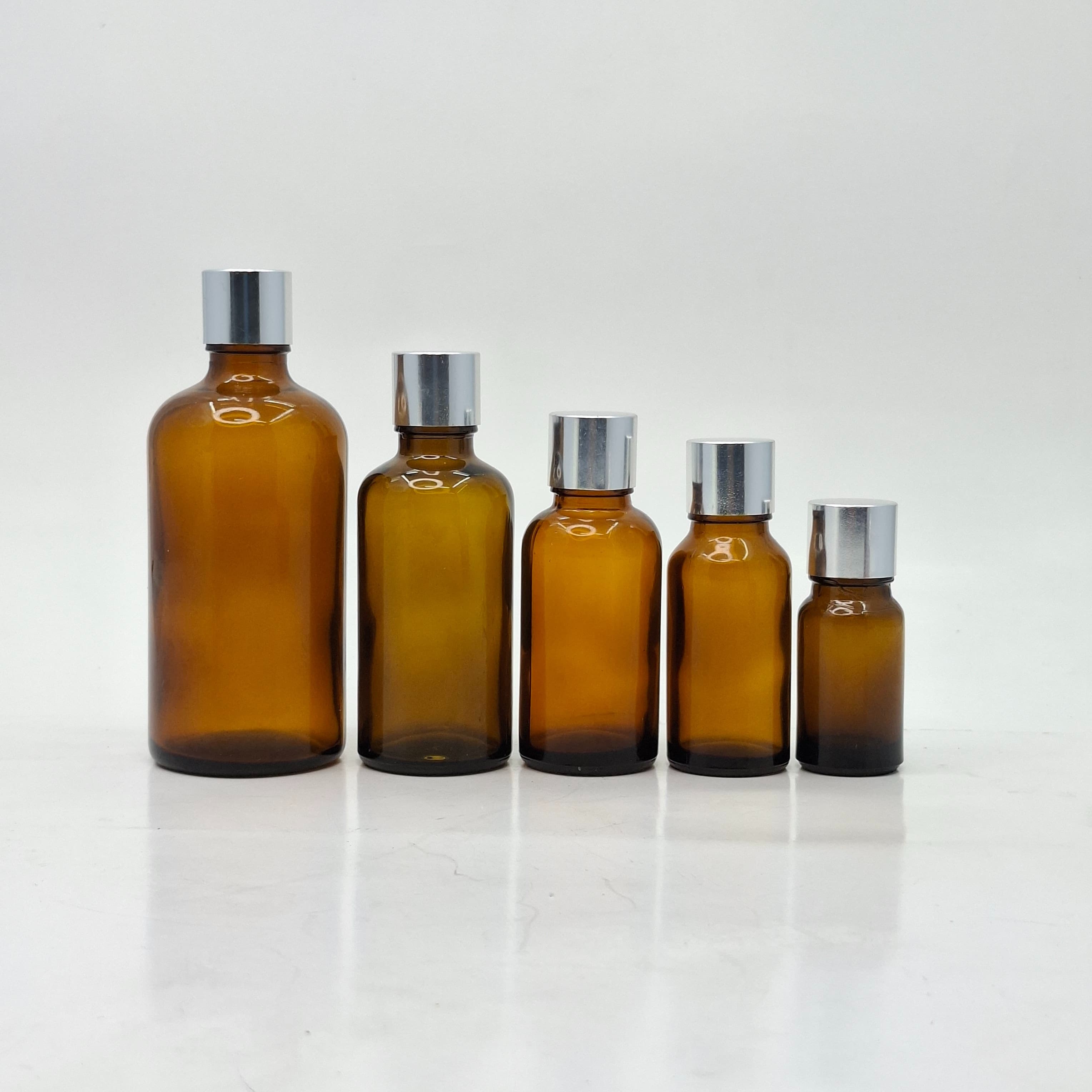 Main image of 10ml-100ml Amber Glass Bottle - Shine Silver Lid