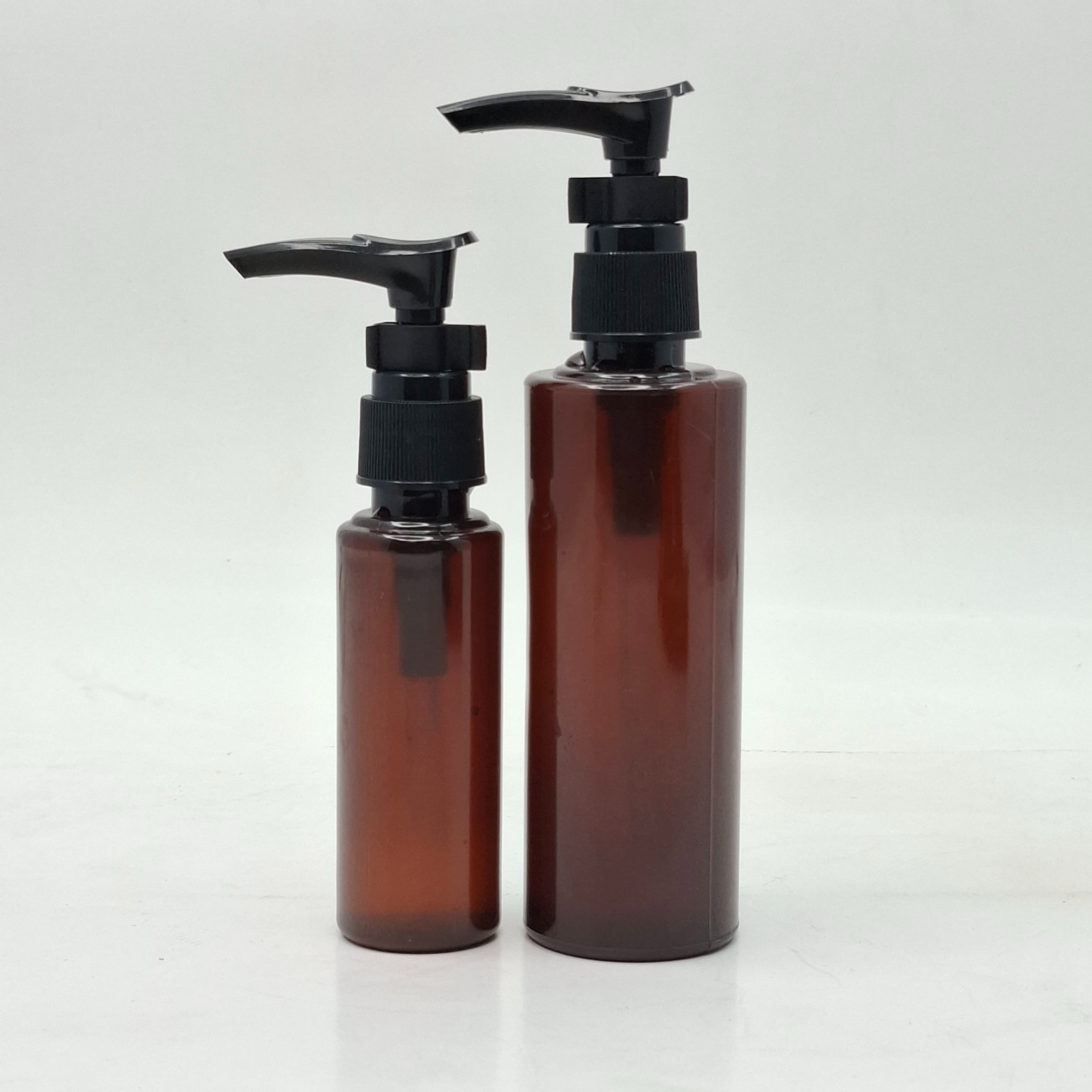 Main image of 50ml-100ml Round Bottle Amber - Clip Pump Black