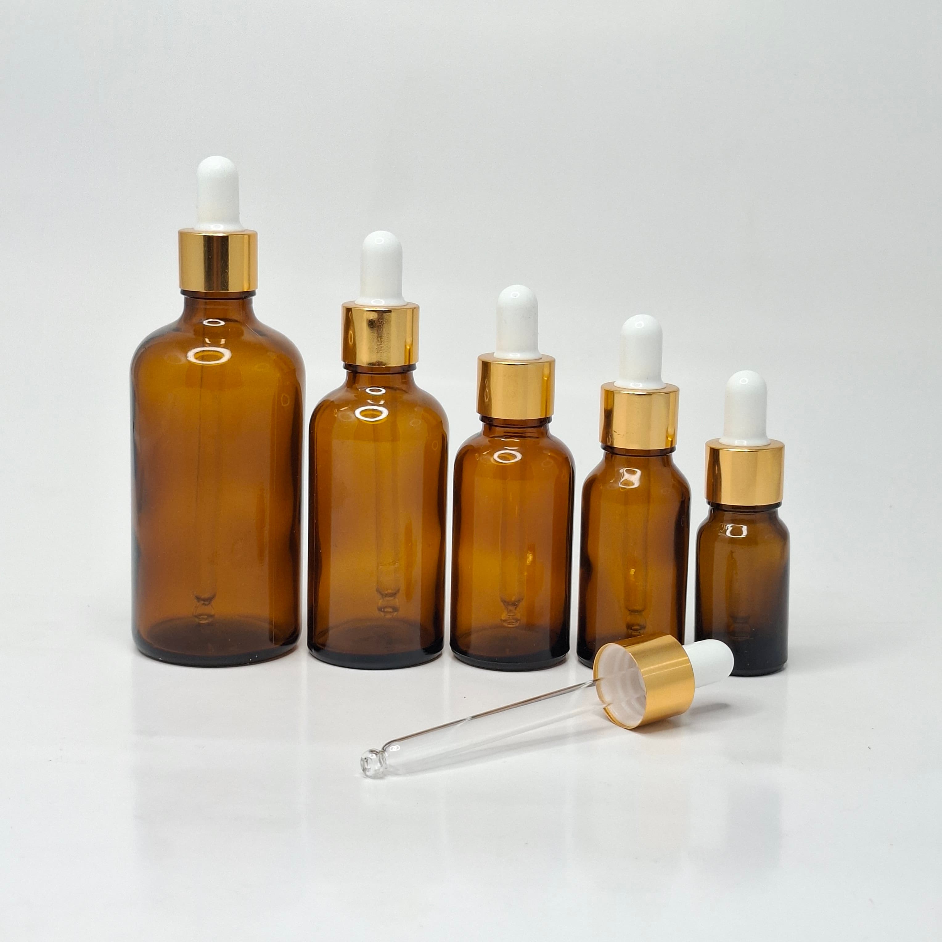 Main image of Amber Serum Bottle - Gold / White
