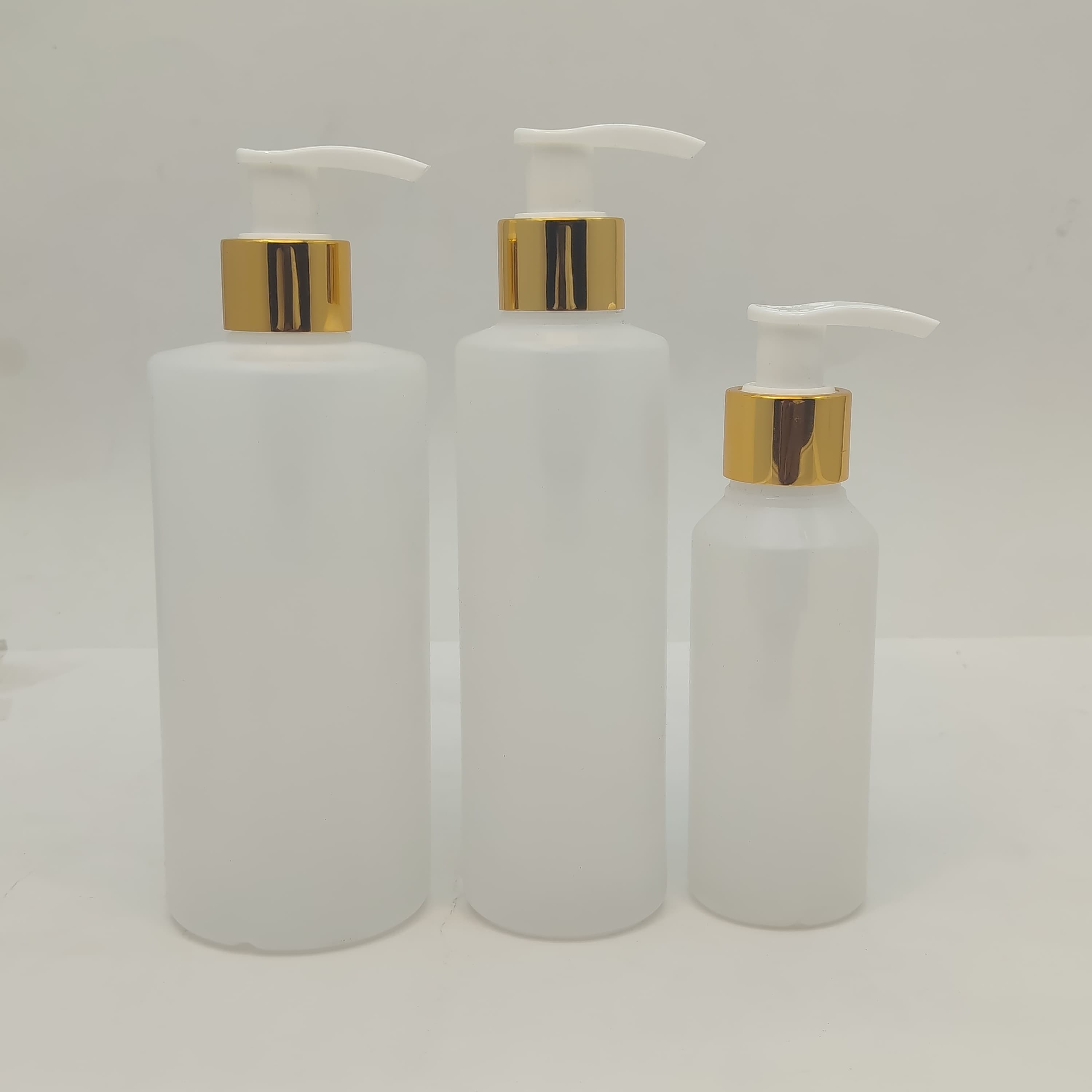 Main image of 100ml-340ml HDPE Clear Bottle - Gold White Pump