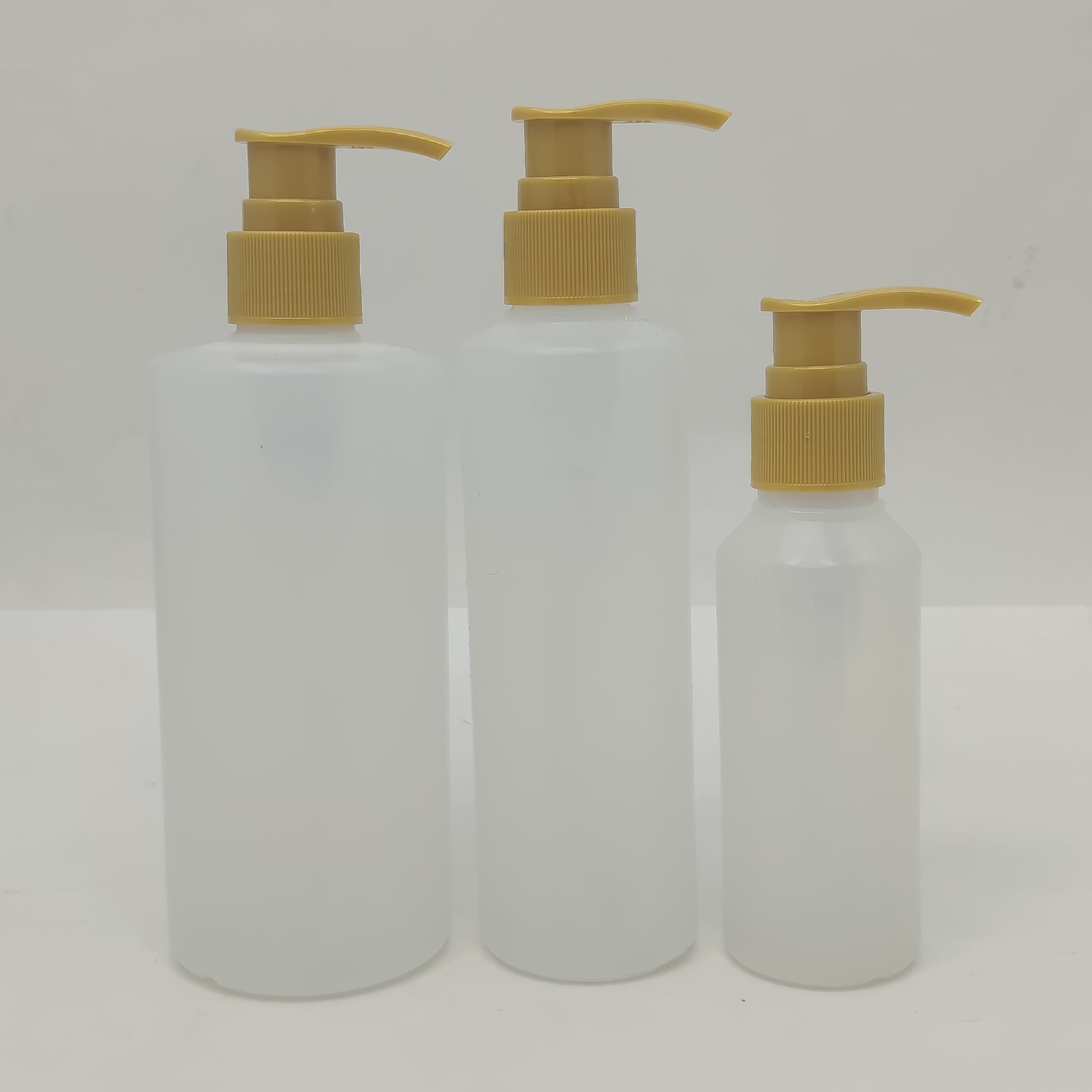 Main image of 100ml-340ml HDPE Clear Bottle - Gold Colour Pump