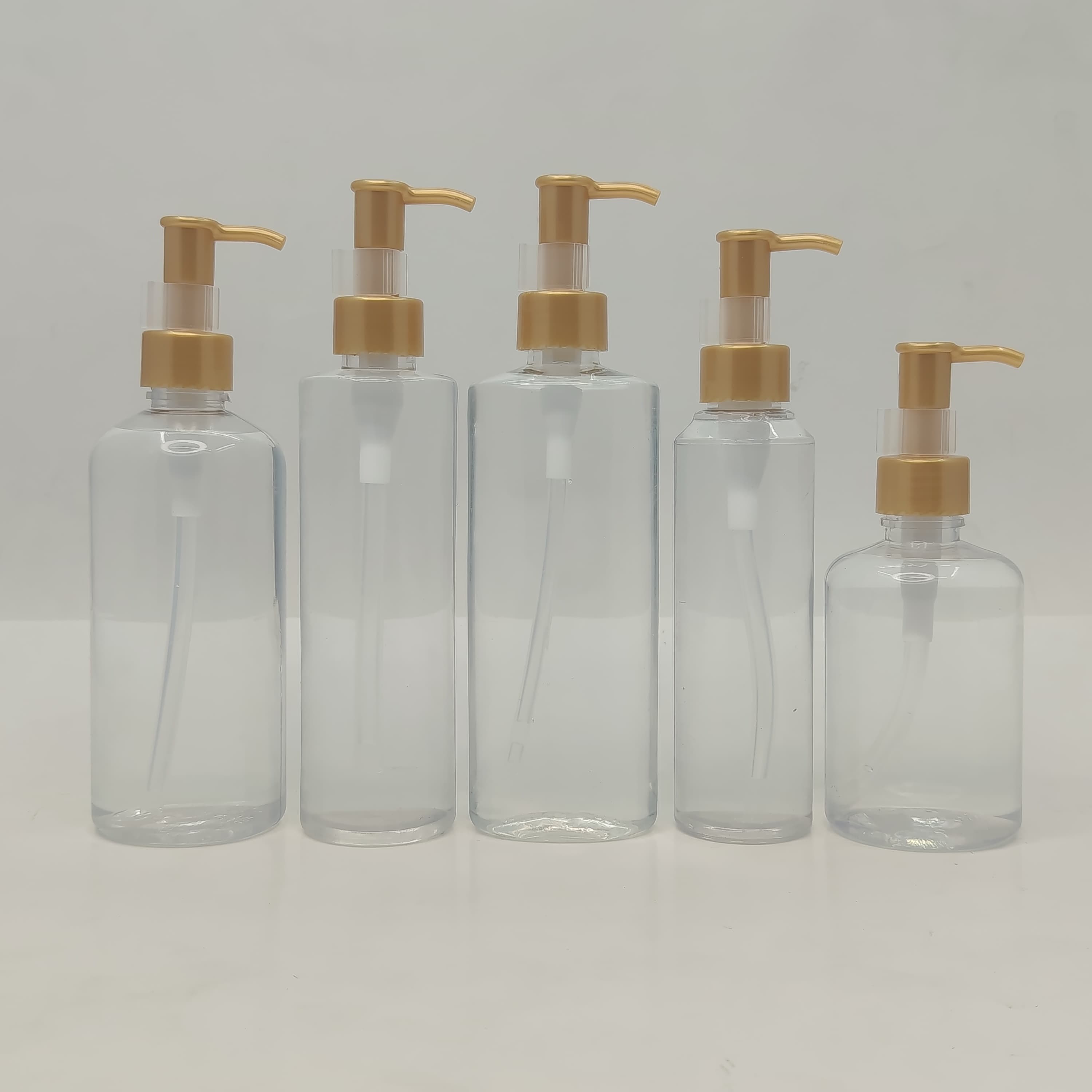 Main image of 150ml-300ml Clear Bottles - Gold Cream Pump - Long Neck