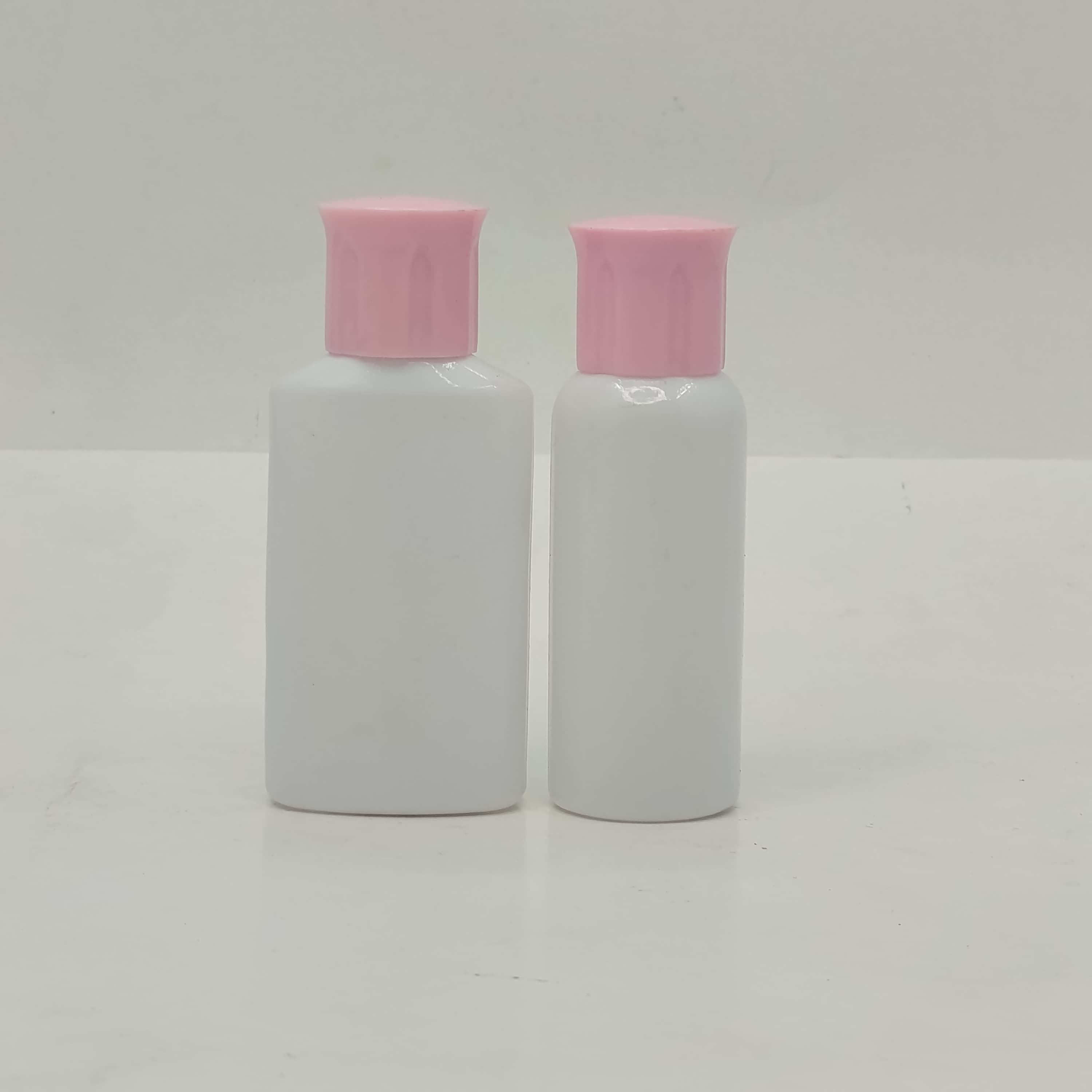 Main image of 40ml-50ml Milk White Bottle - Oil Lid Pink