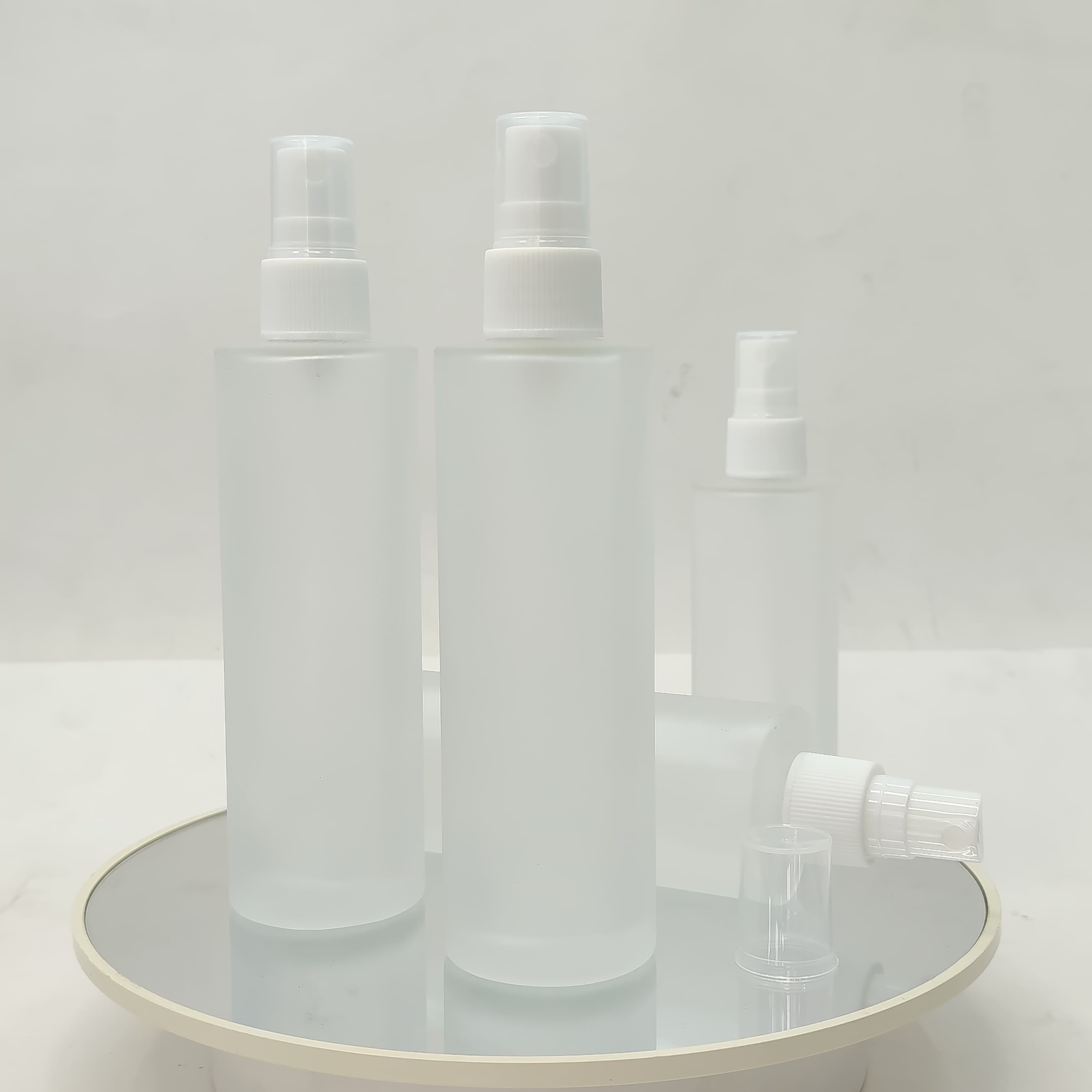 Main image of 100ml Frosted Glass Bottle - White Sprayer