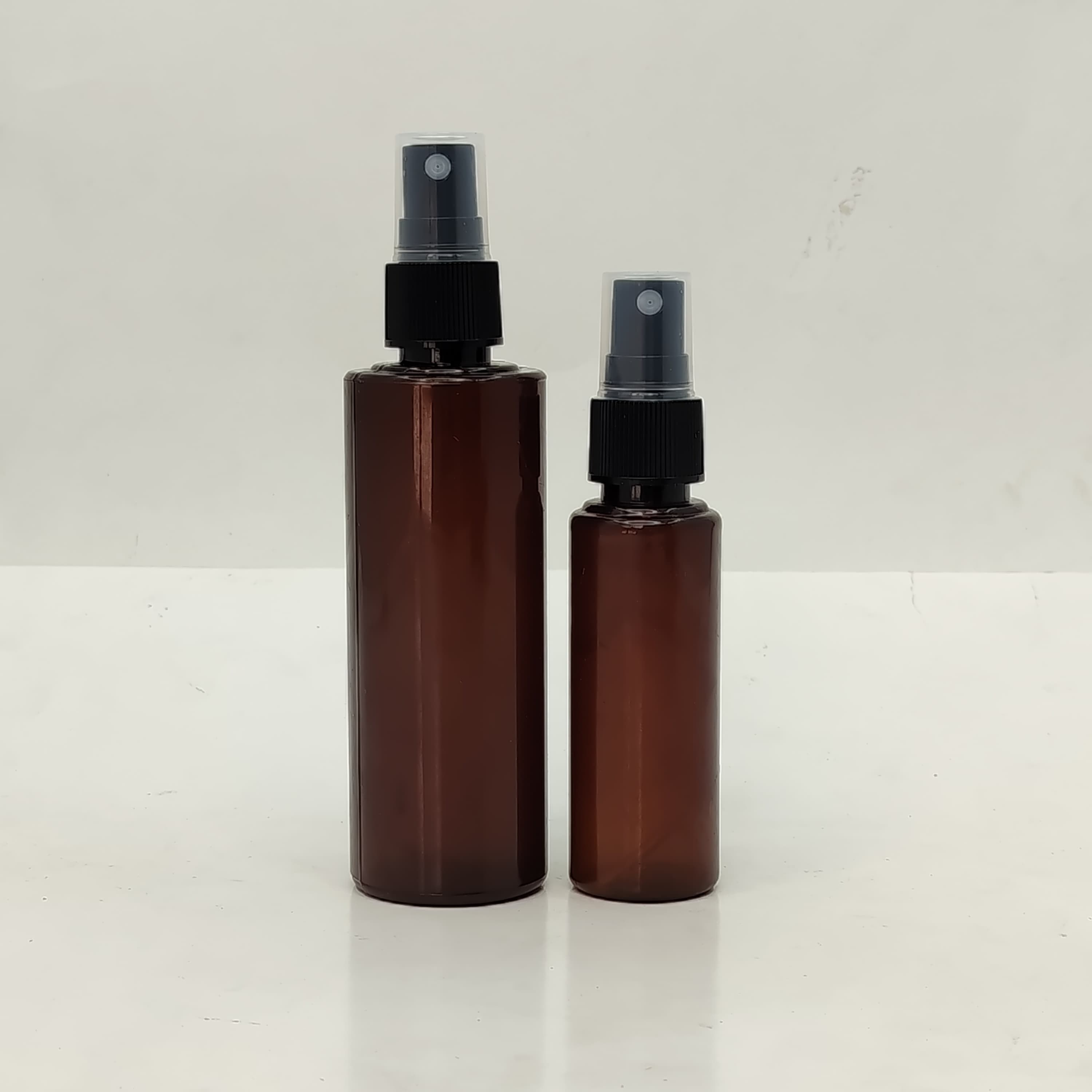 Main image of 50ml-100ml Round Bottle Amber - Black Spray
