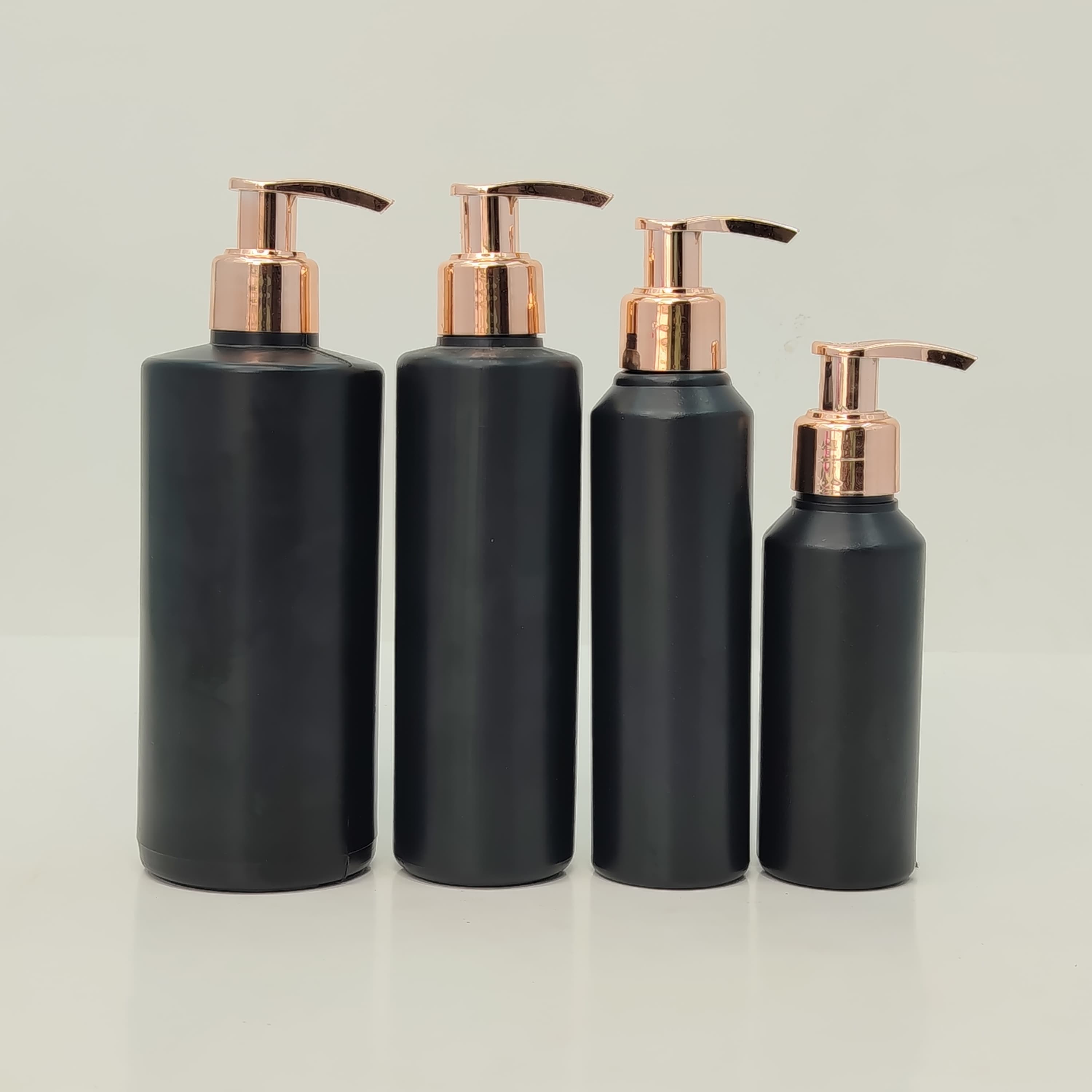 Main image of 100ml-340ml HDPE Black Bottle - Rose Gold Pump