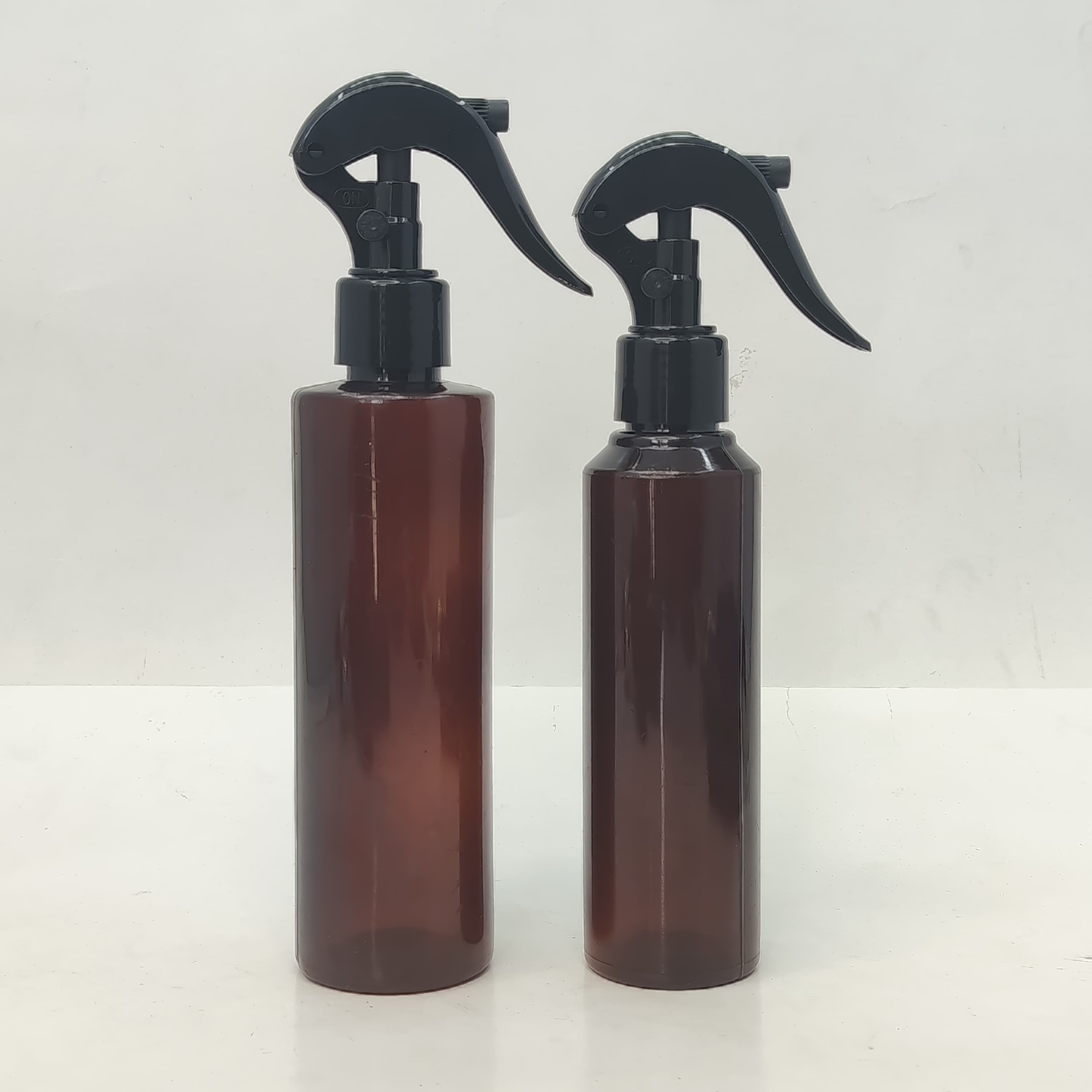 Main image of 150ml-200 Amber Round Bottle - Mini Trigger Black