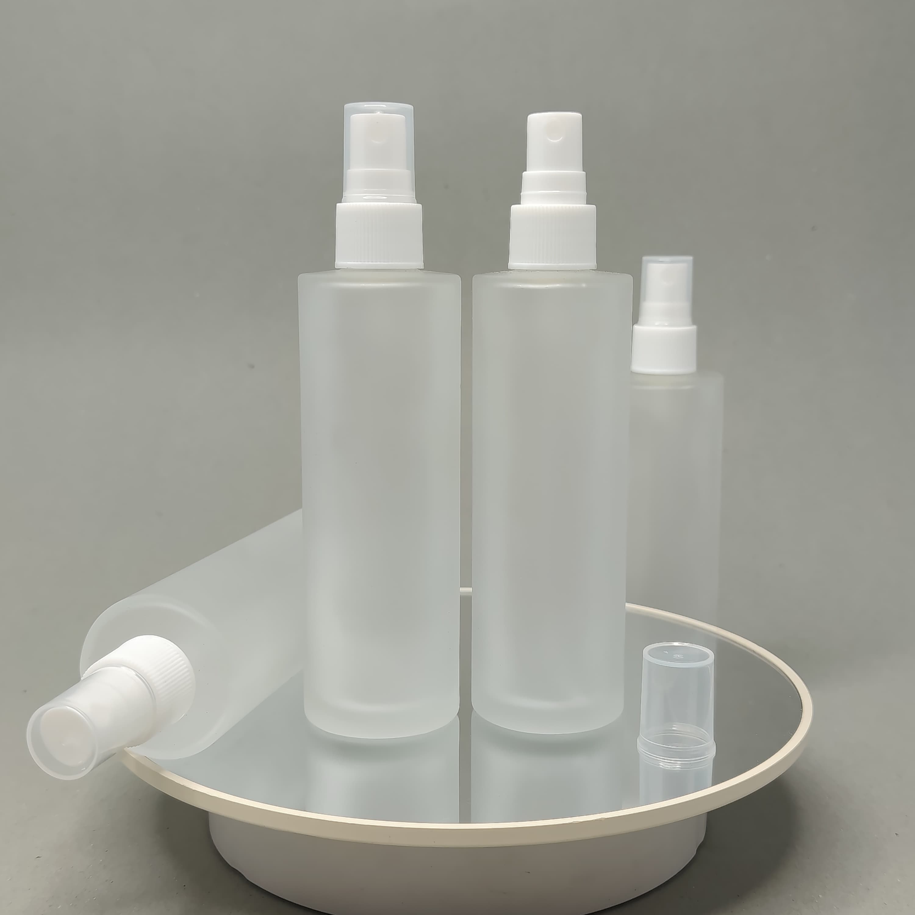 Main image of 100ml Frosted Glass Bottle - White Sprayer